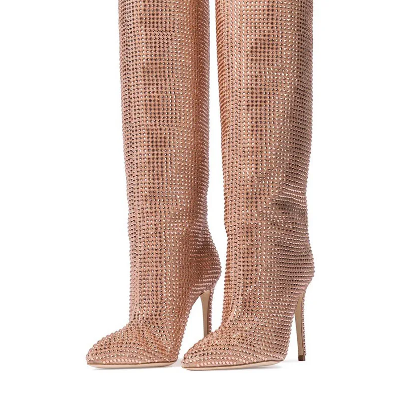 Rose gold studded knee-high boots on a white background