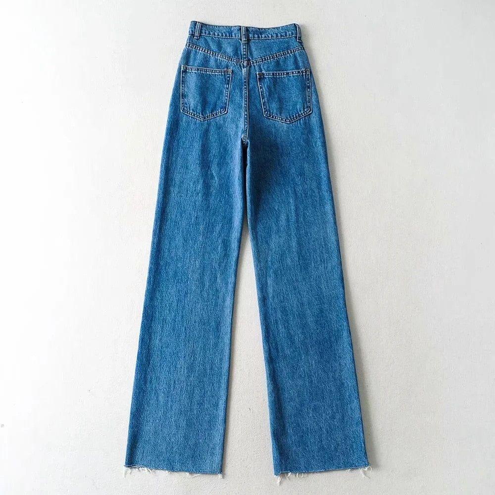 Blue jeans on a light gray background
