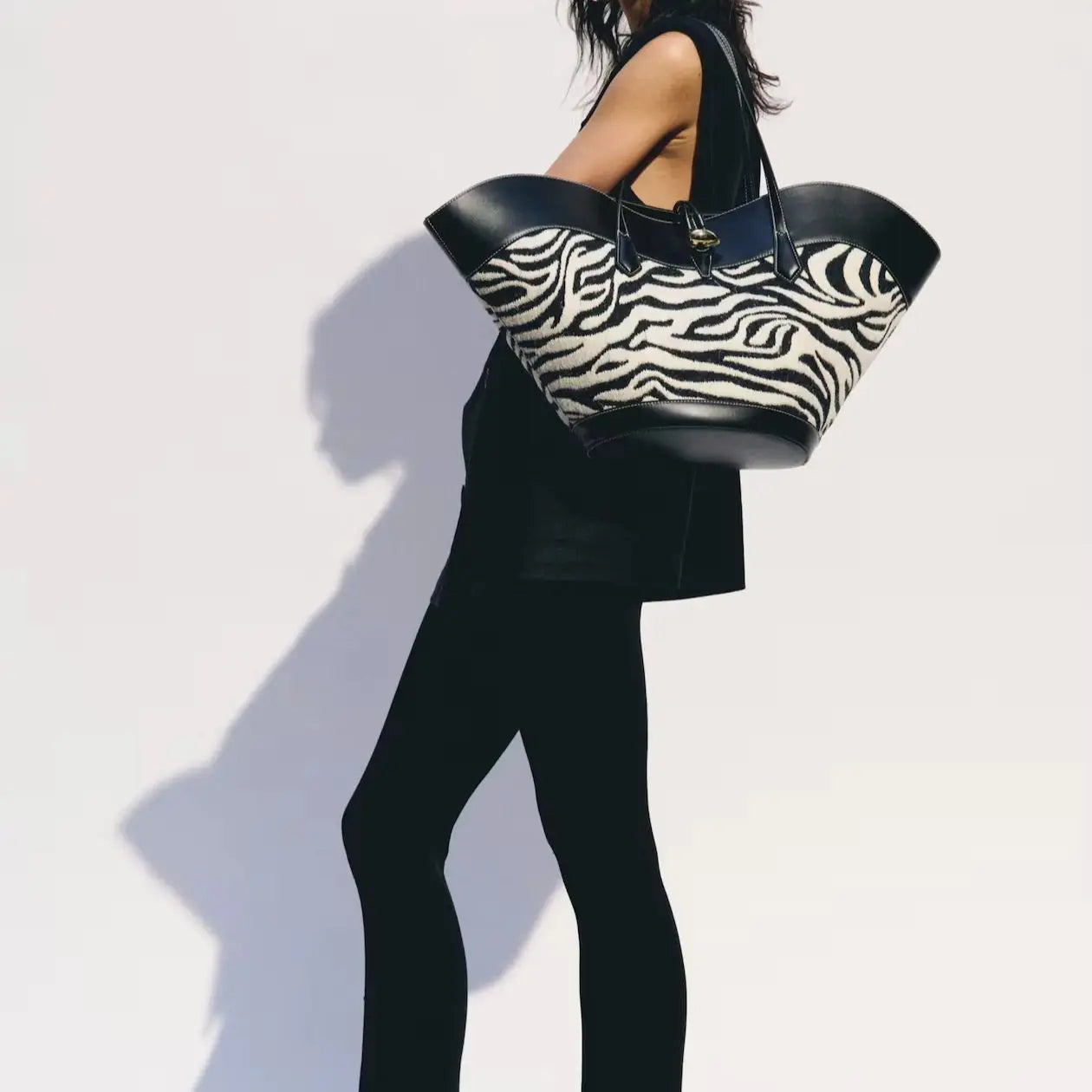 zebra print oversized tote handbag with leather trim