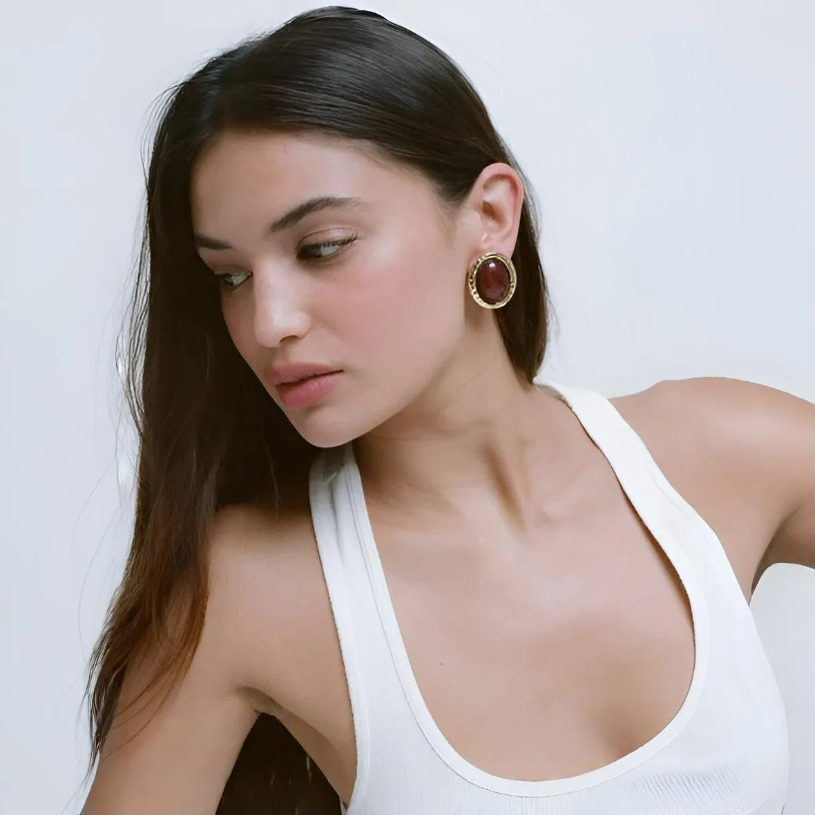 white sleeveless top with scoop neckline