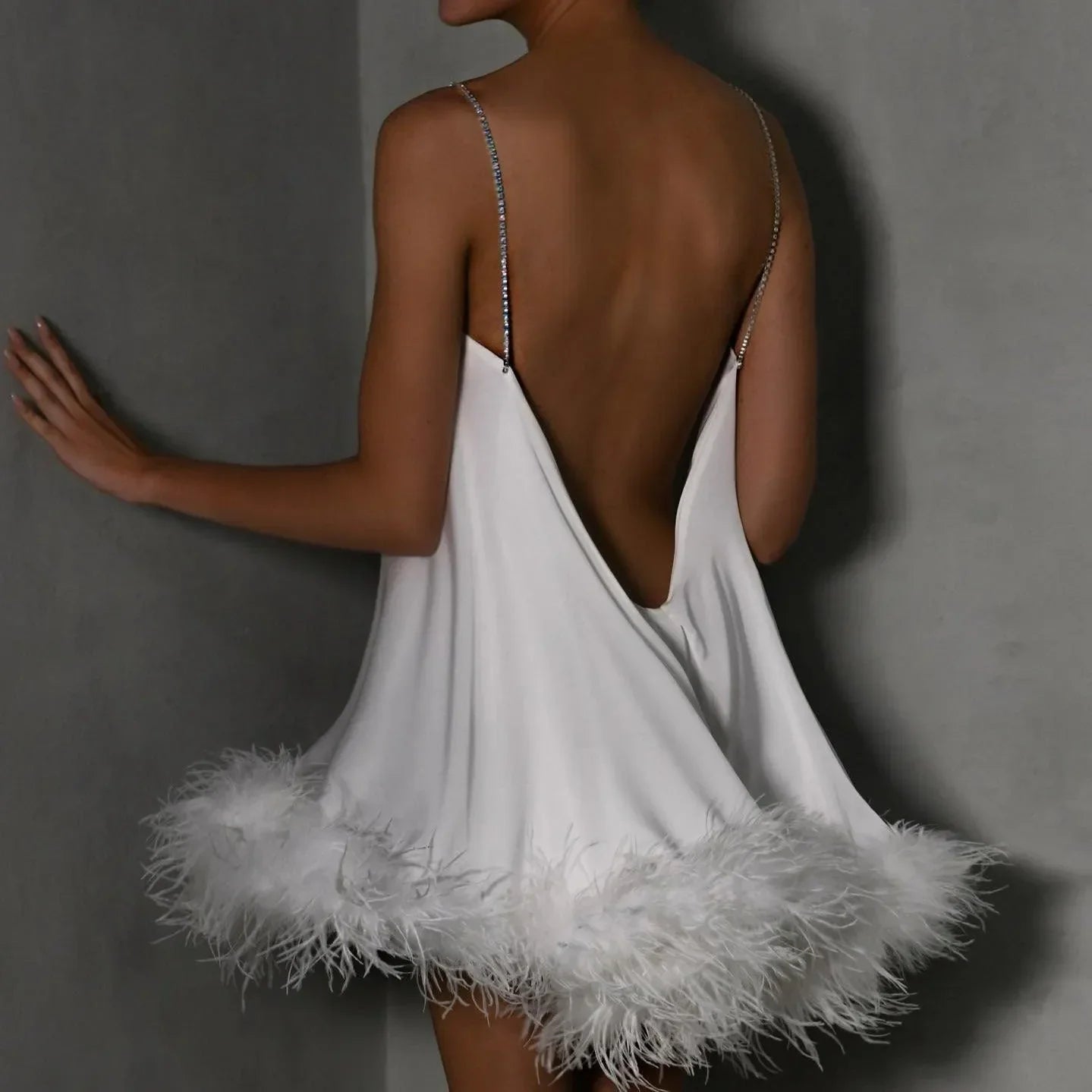 backless mini dress with feather trim, evening wear