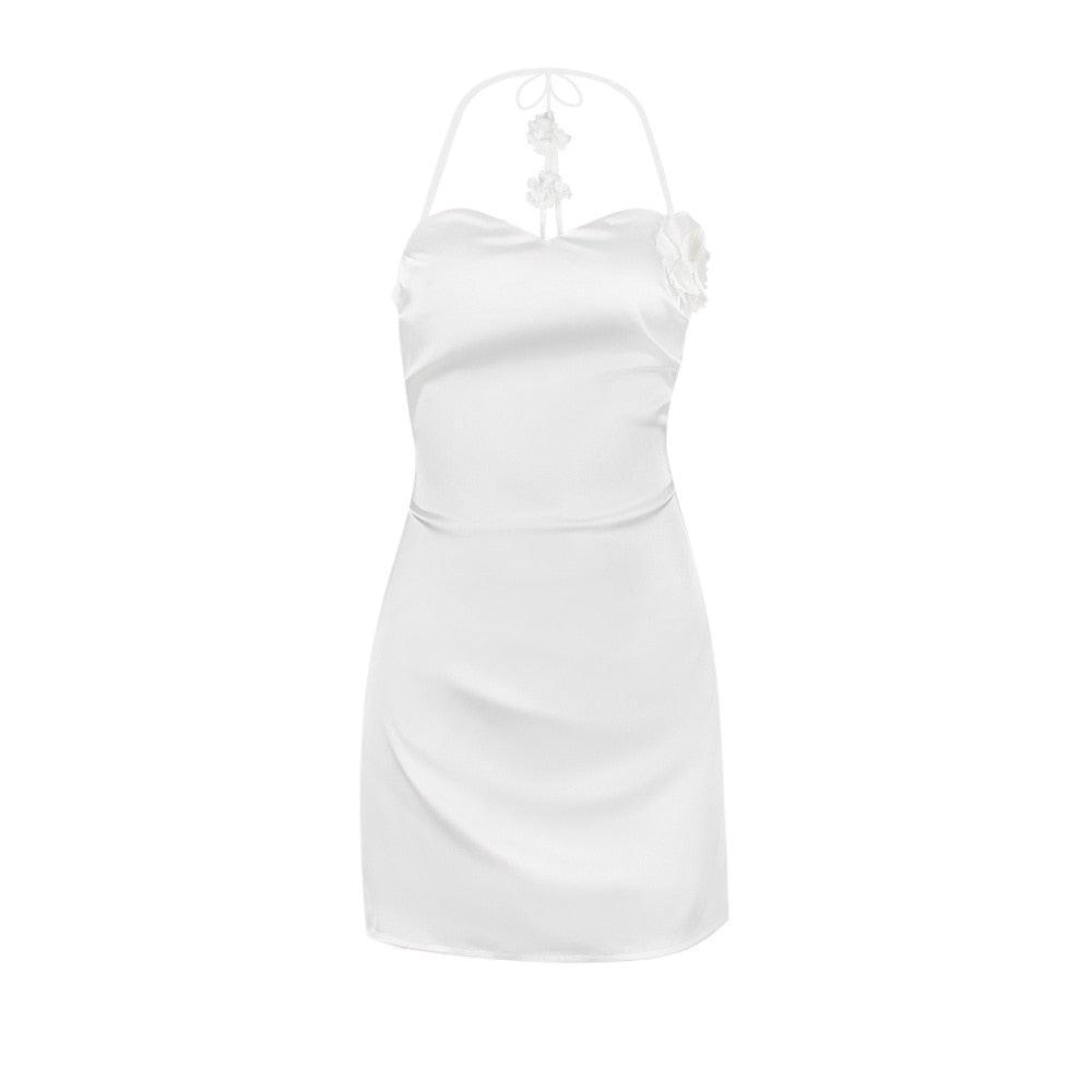 Satin halter-neck mini dress with floral detailing, elegant evening wear
