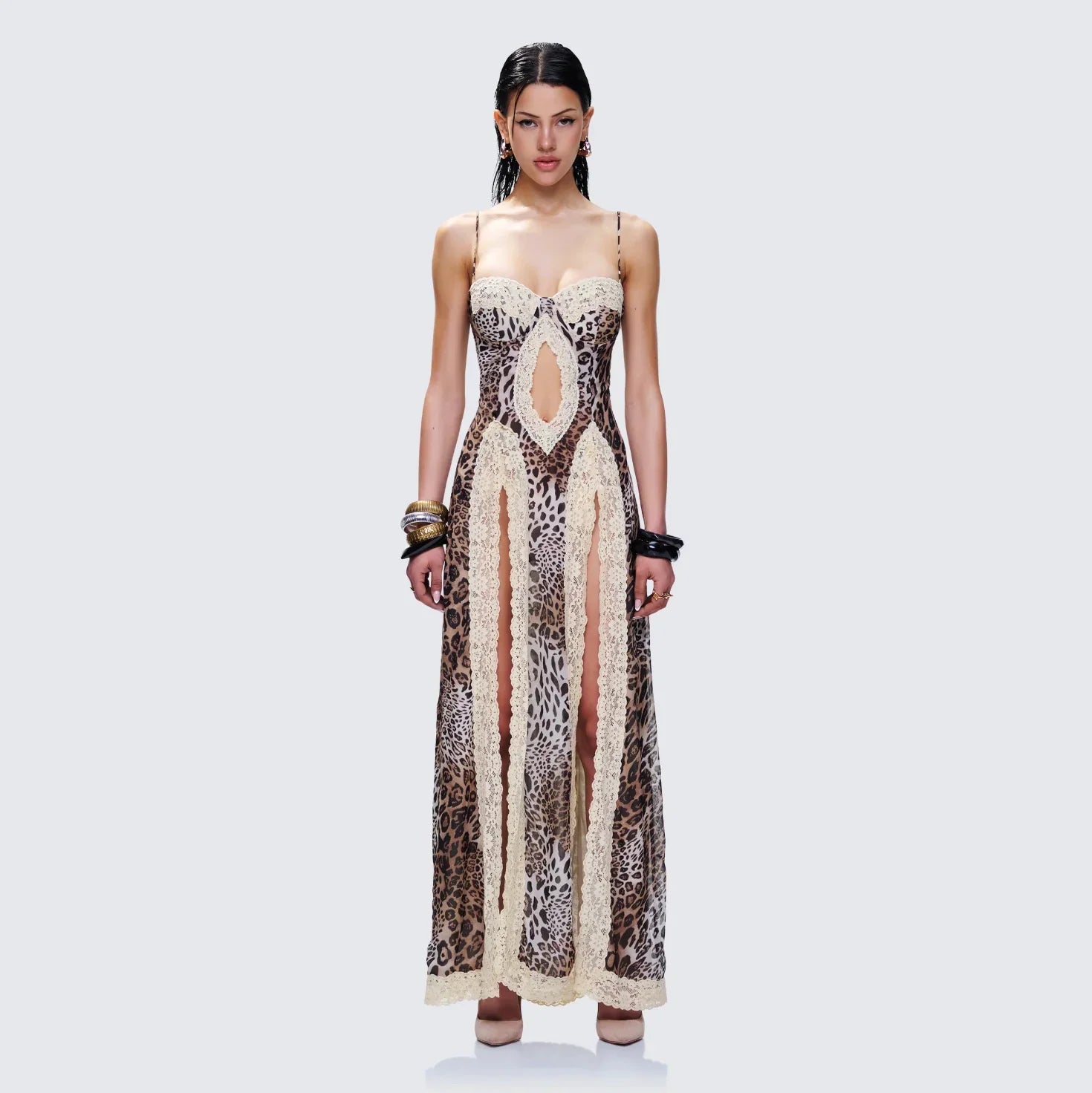 Leopard print maxi dress with lace detailing, statement evening gown.
