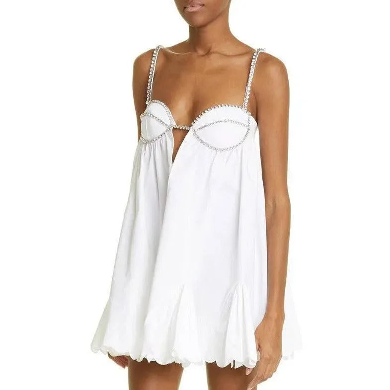 White babydoll mini dress with rhinestone straps, chic party dress
