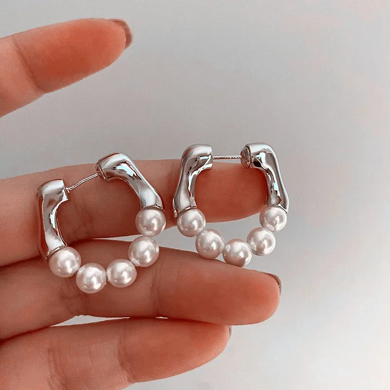Silver and pearl hoop earrings, chic accessory for elegant looks
