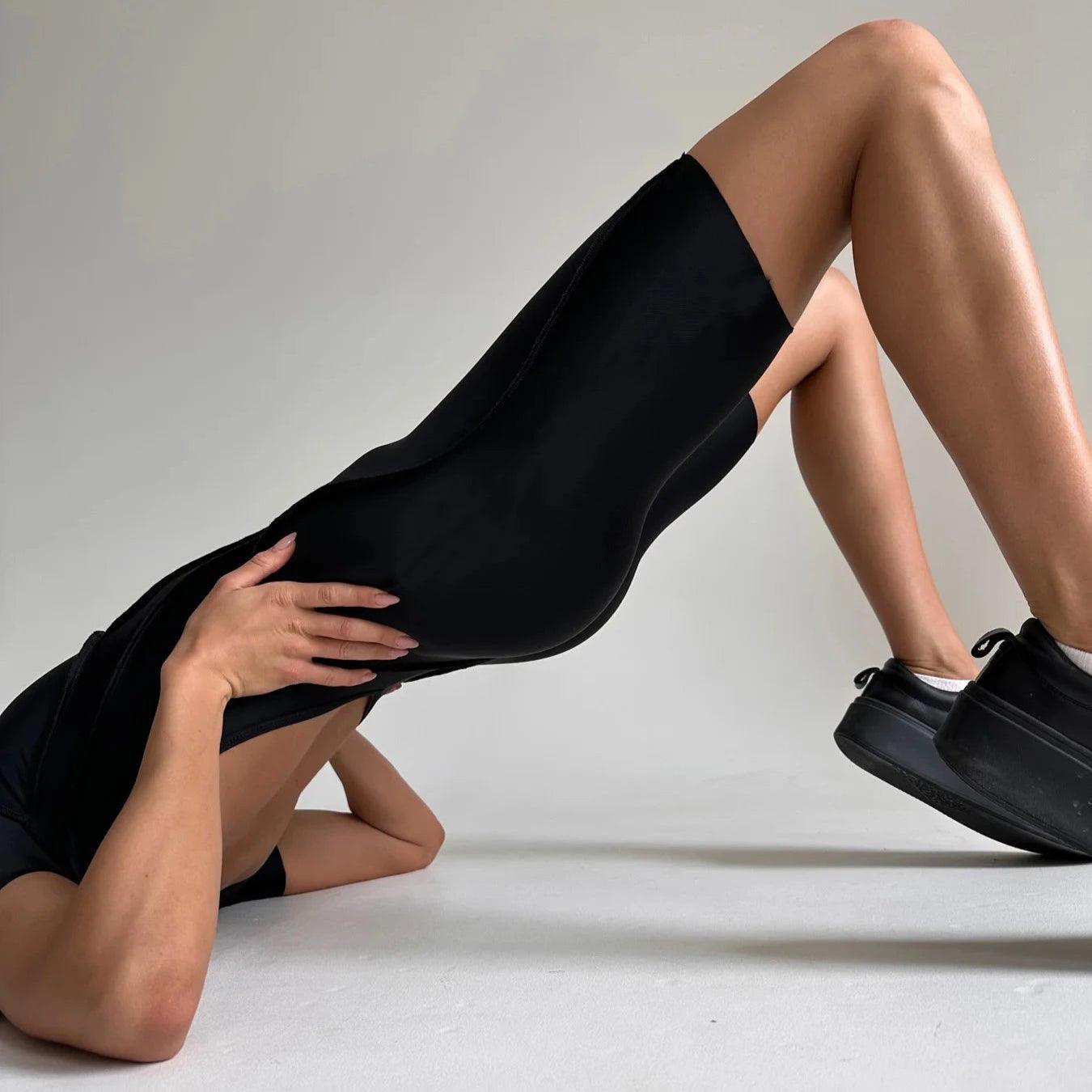 Form-fitting black biker shorts, athletic and casual wear.