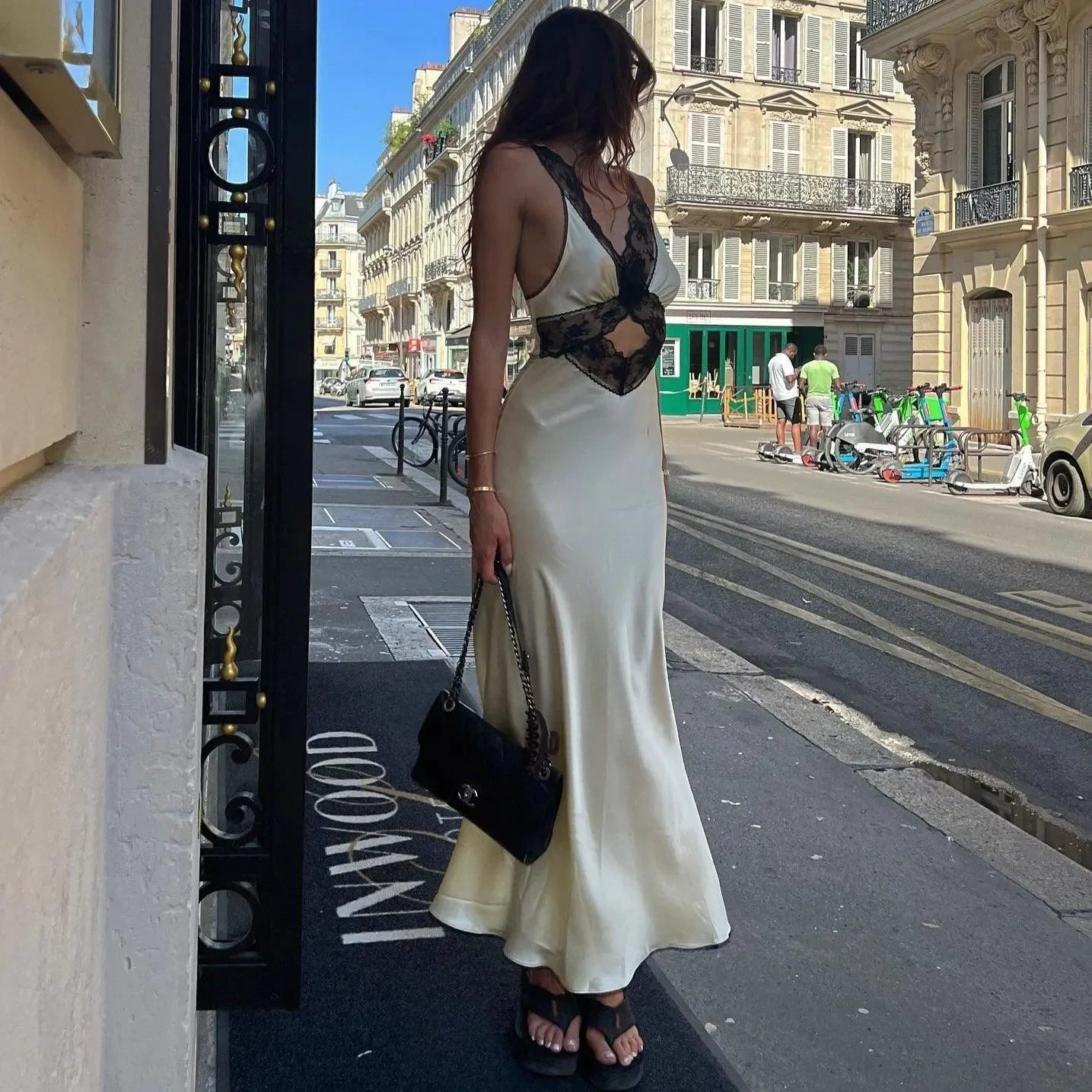 Silk maxi dress with lace detailing, evening look.