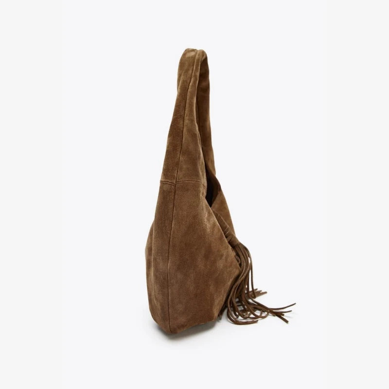 Brown suede shoulder bag with fringe detail.