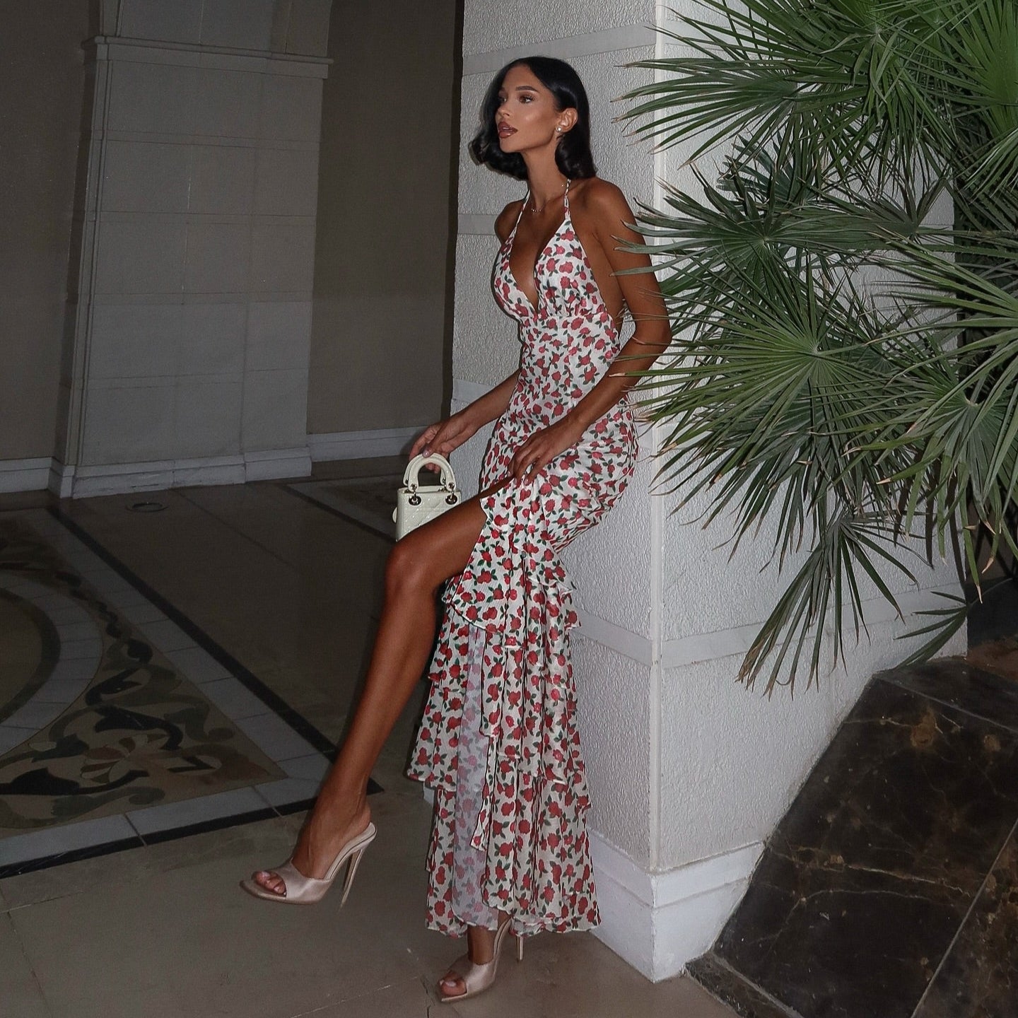 Floral maxi dress with side slit, ideal for a summer evening look.