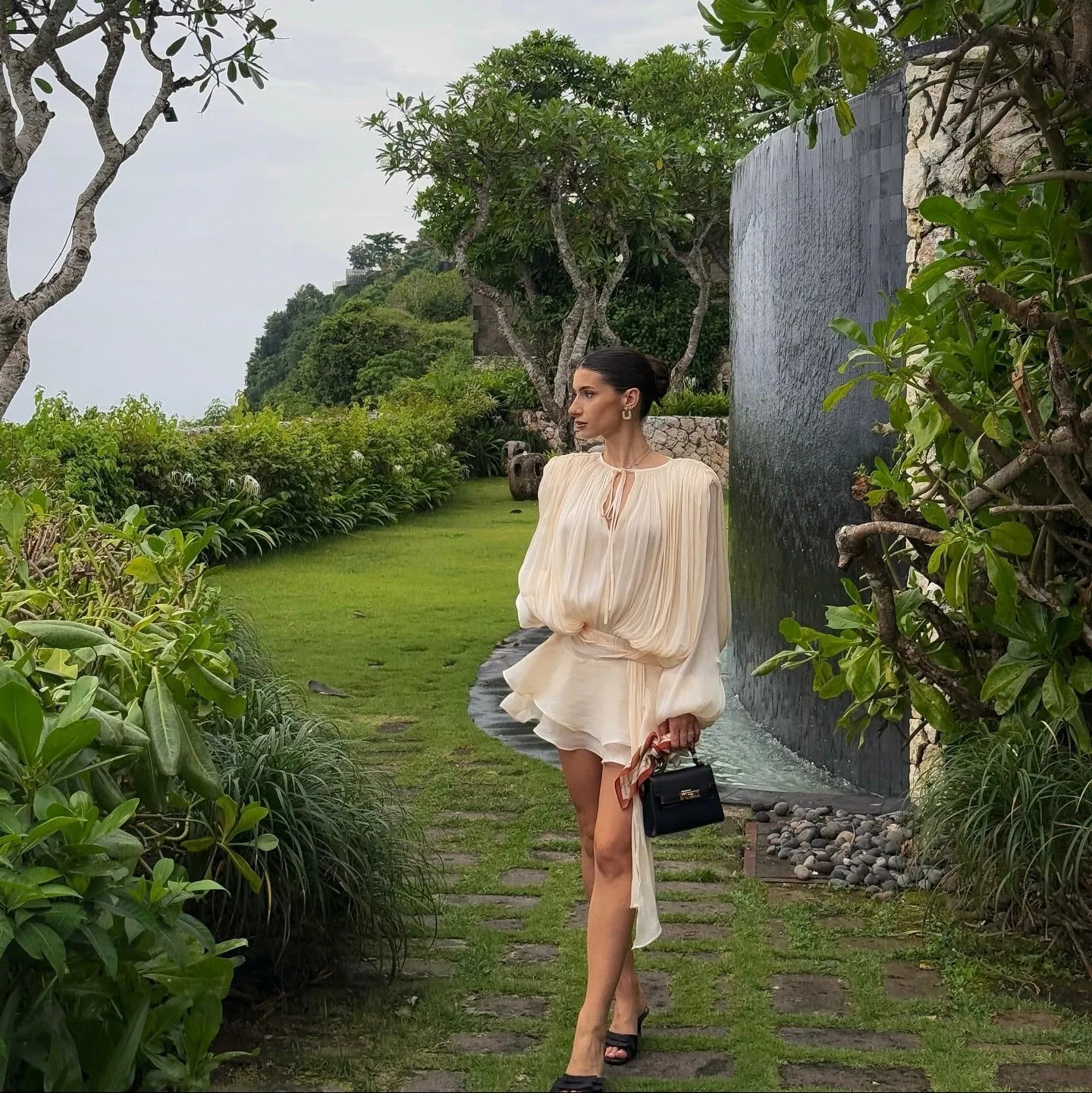 Pleated chiffon mini dress with long sleeves, elegant daytime outing look