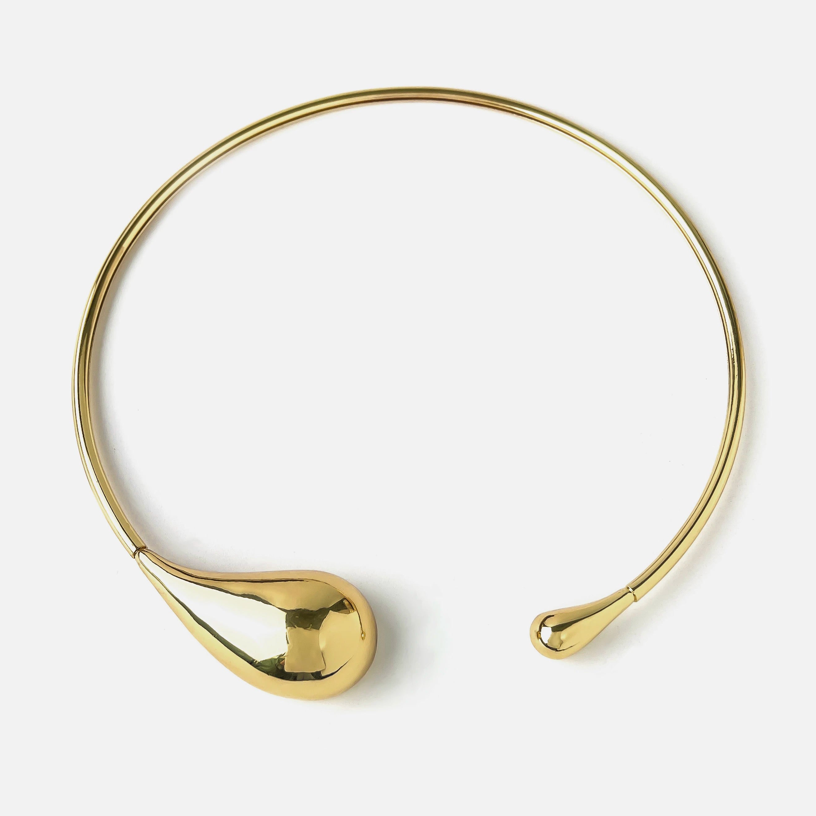 Sculptural gold choker necklace, elegant statement accessory