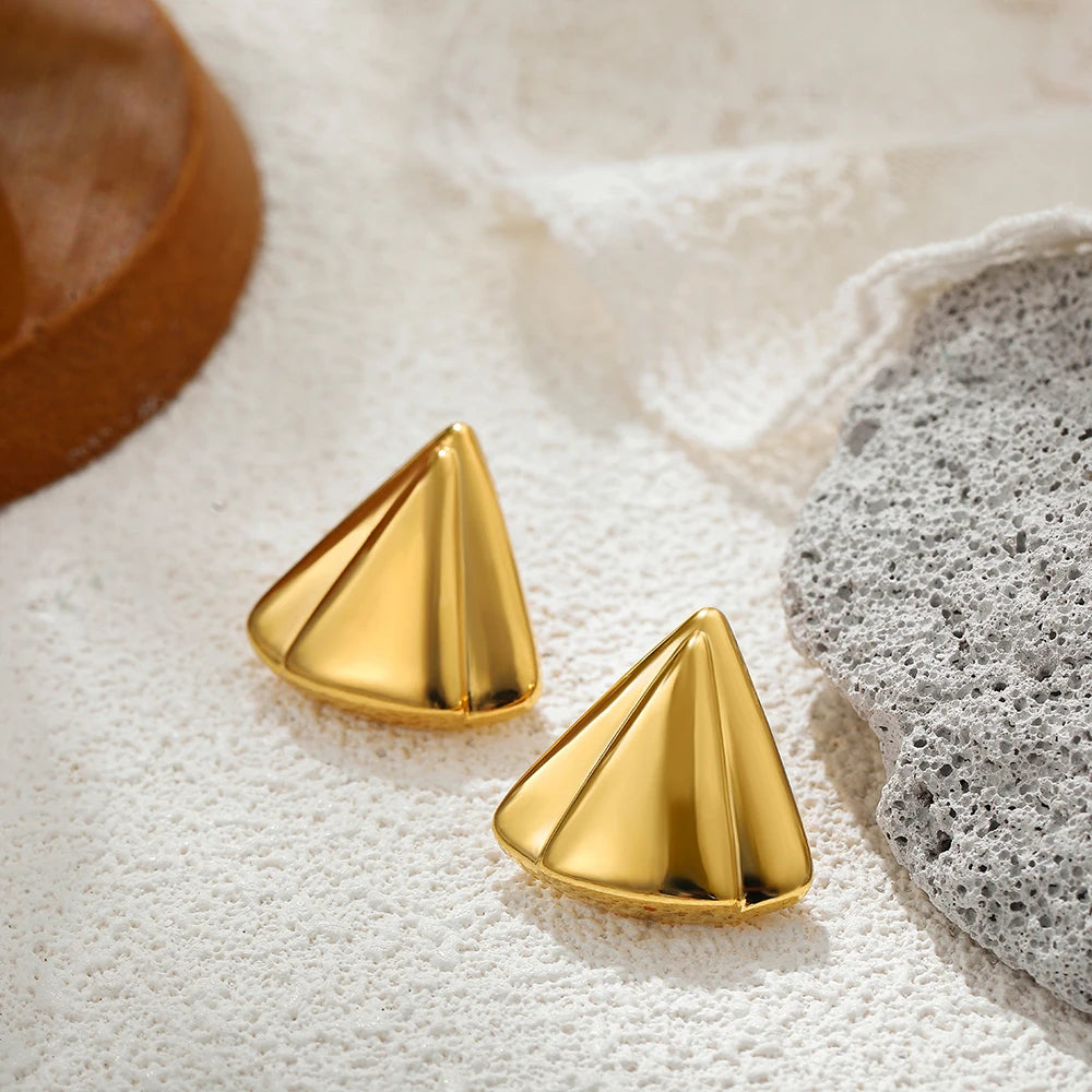 Gold geometric stud earrings, sleek accessory for elegant styling