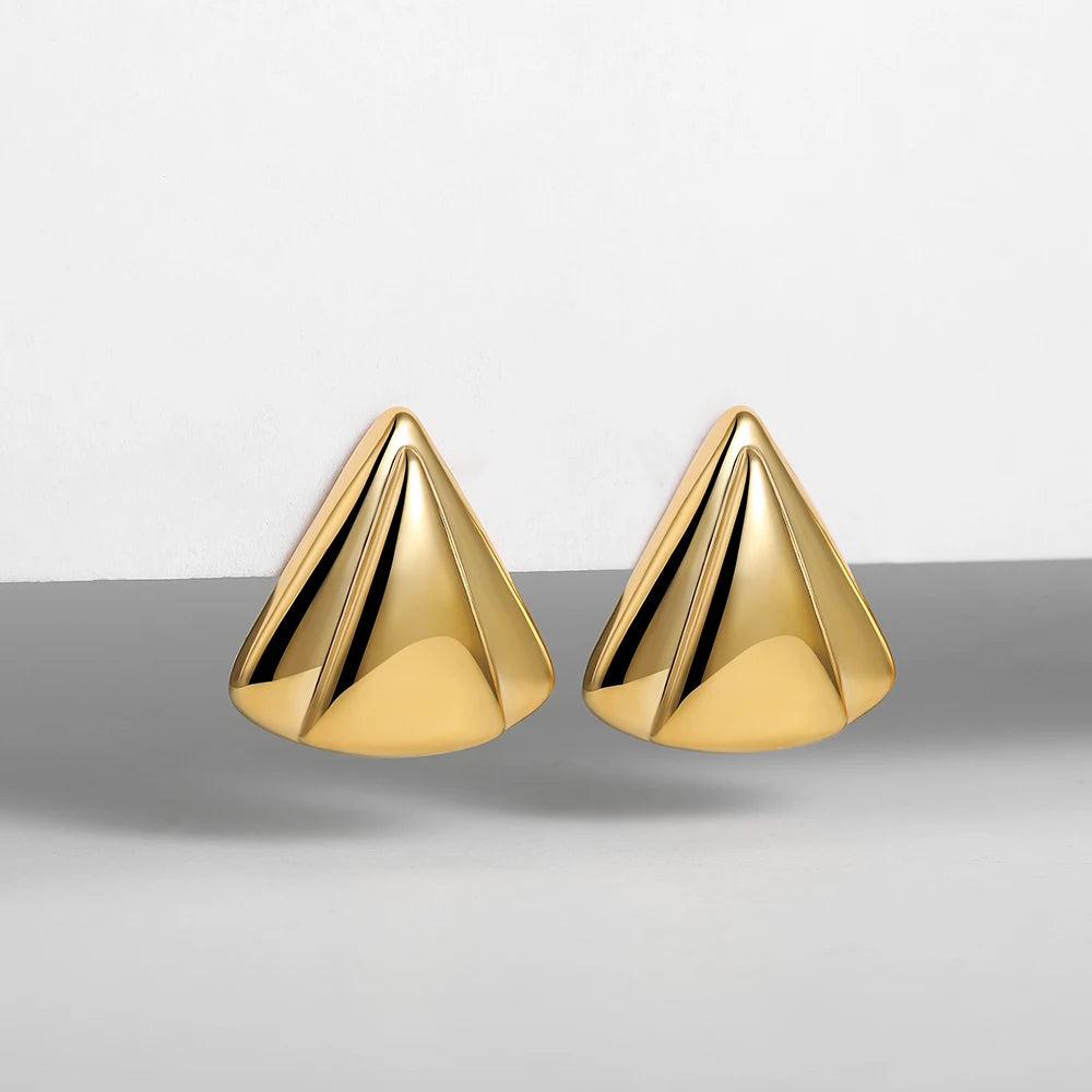 Gold geometric statement earrings, bold accessory piece