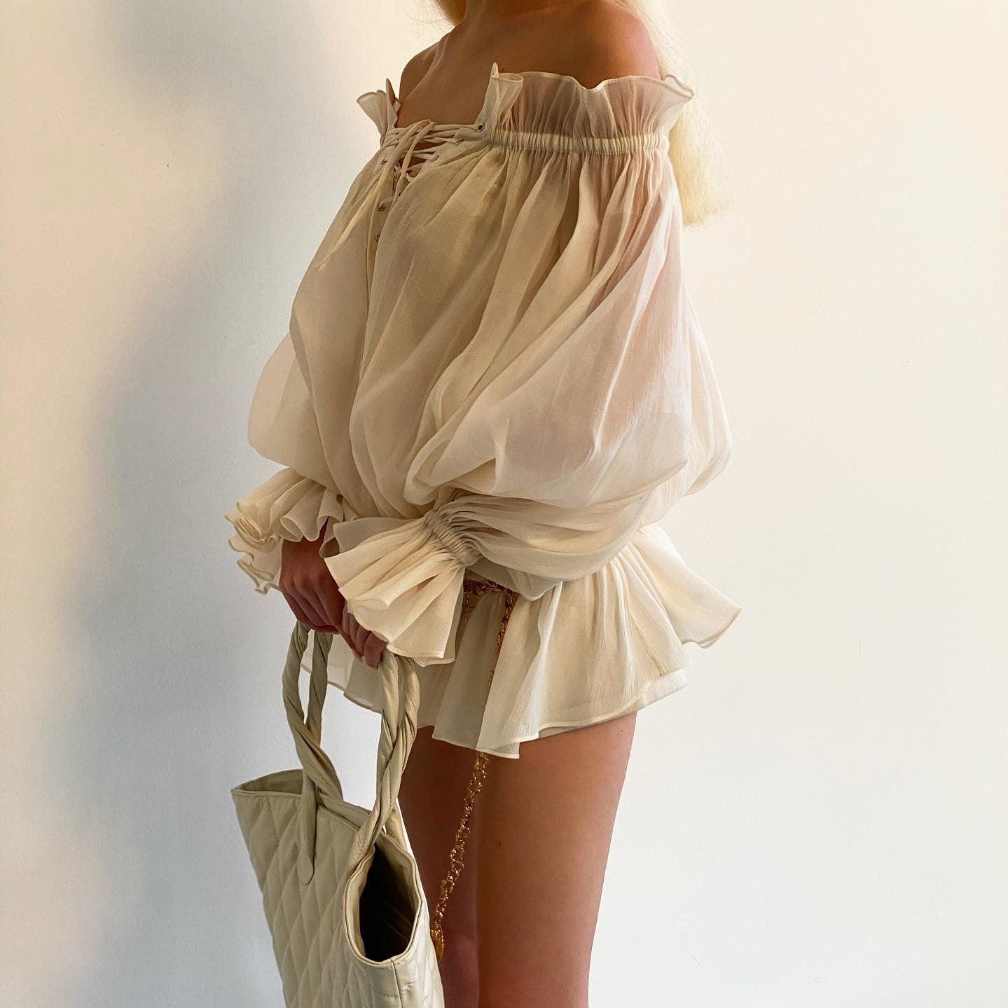off-the-shoulder ruffled mini dress with puff sleeves