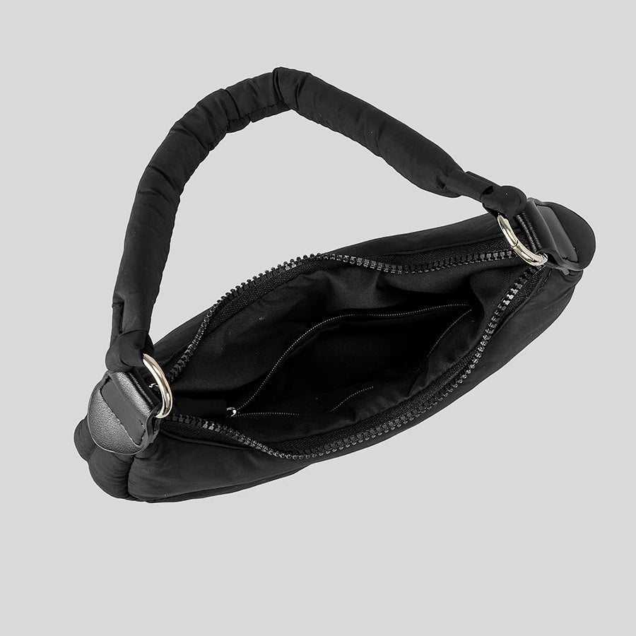 Black ruched satin handbag with top zip, stylish accessory for evening events