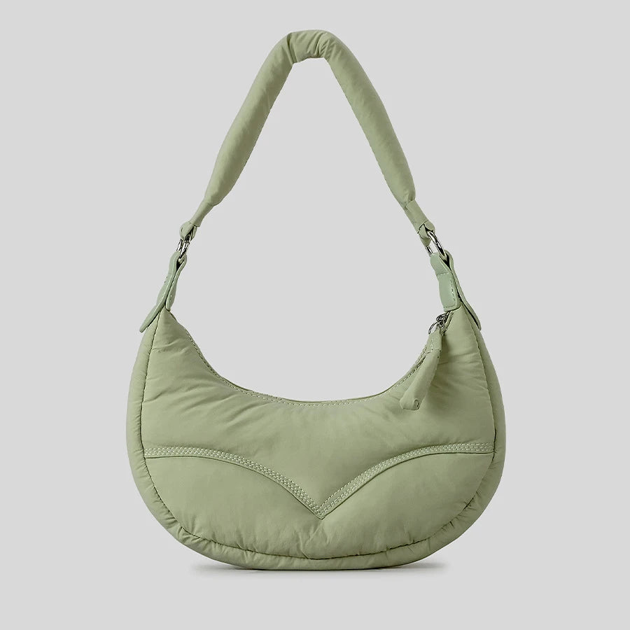 Sage green padded shoulder bag, casual accessory.
