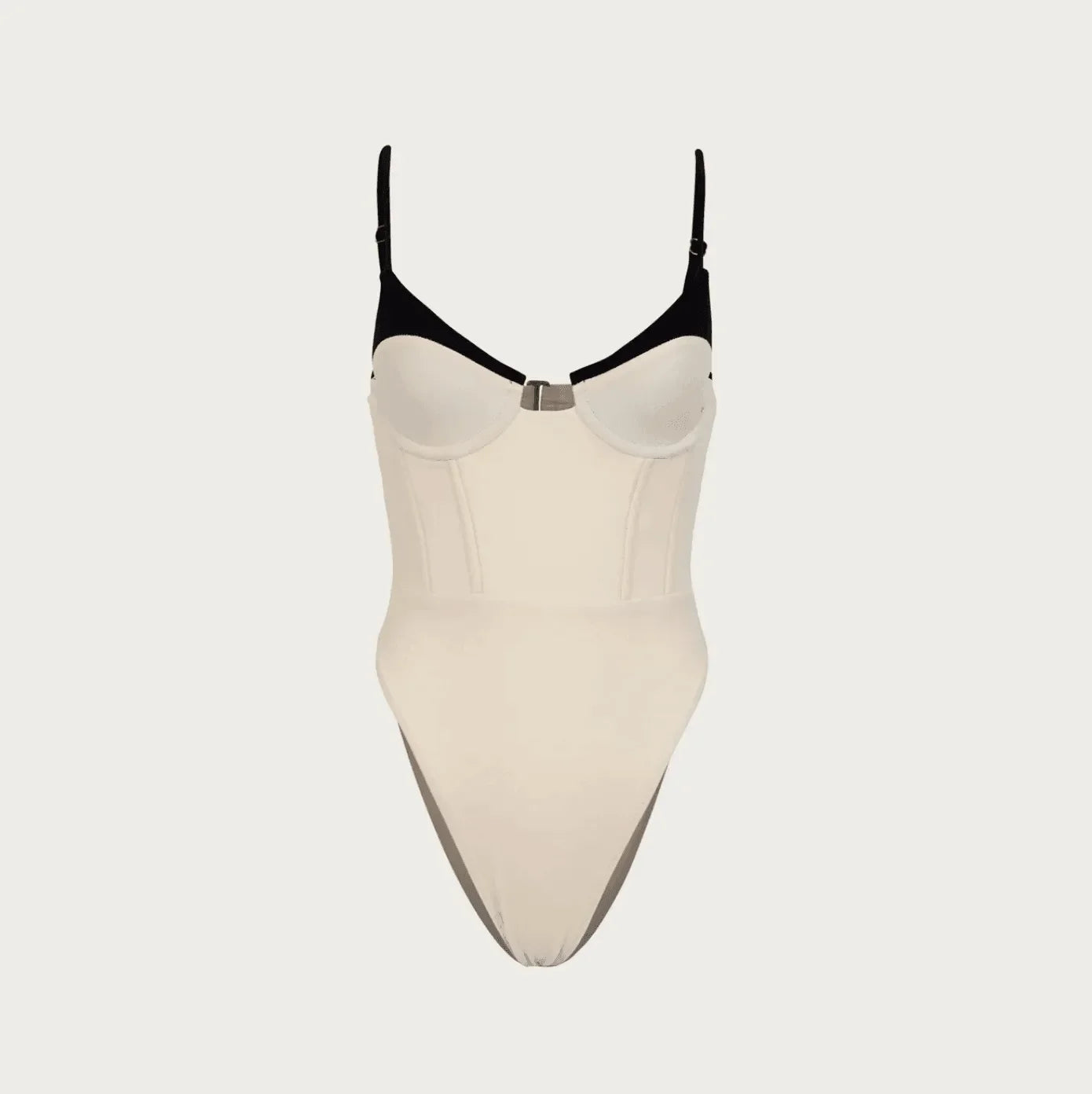 Two-tone corset-style bodysuit with structured cups, versatile party piece.