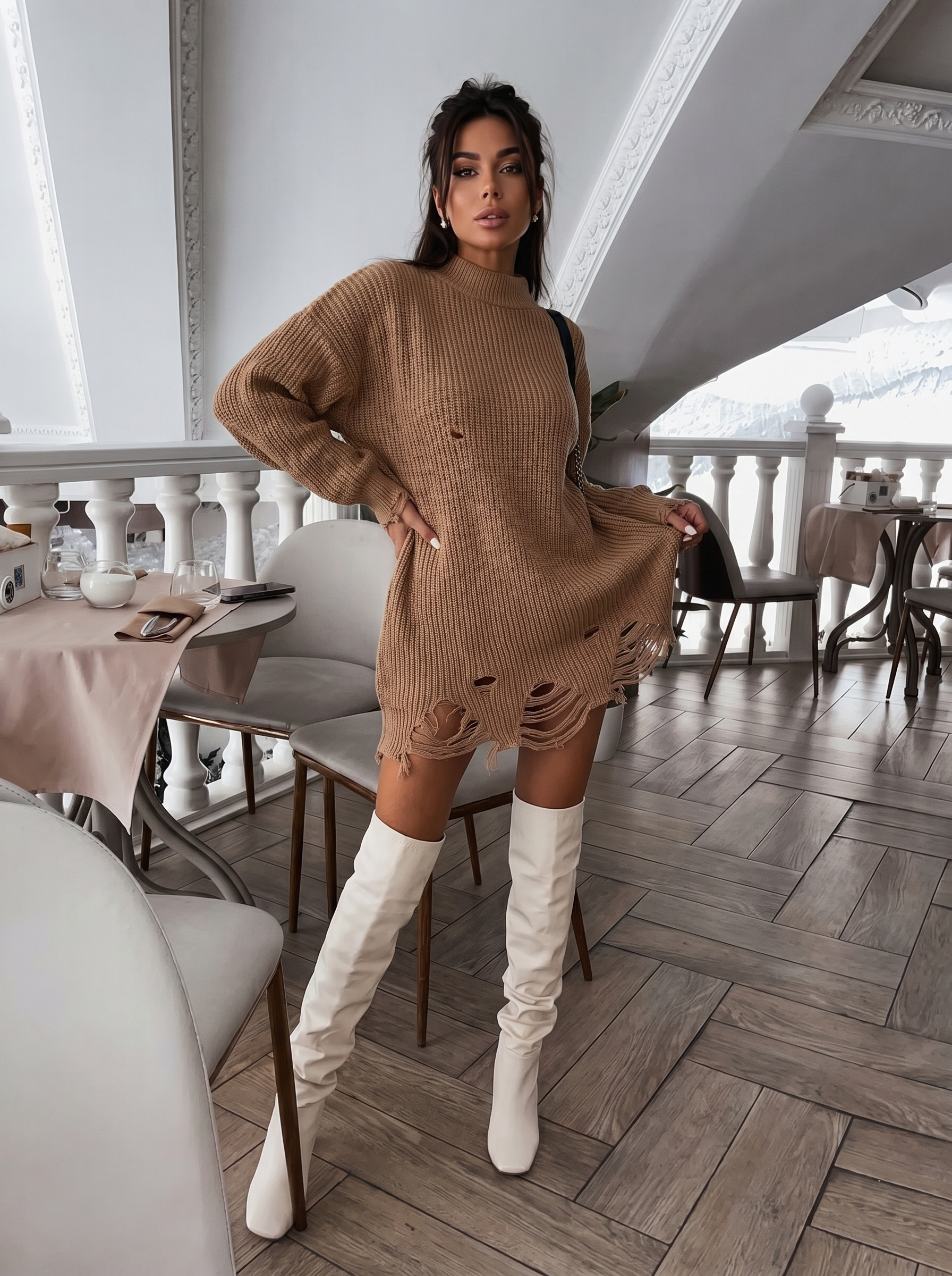 Ribbed knit sweater dress paired with knee-high slouchy boots, chic casual outfit.