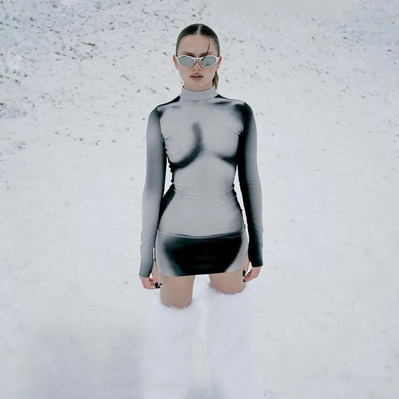 Turtleneck long-sleeve bodycon mini dress with gradient shading, edgy winter fashion.