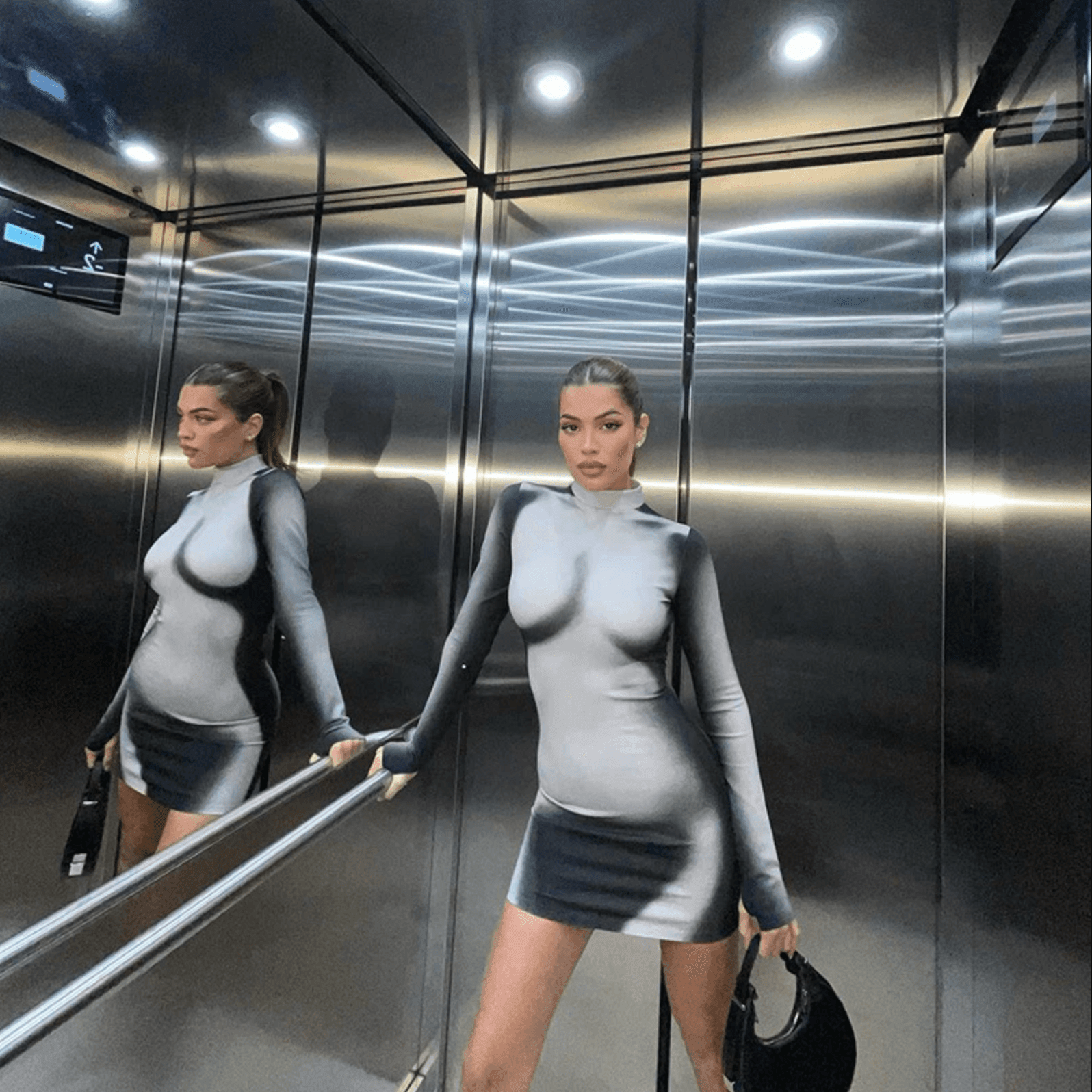 Form-fitting long-sleeve mini dress, modern party outfit.