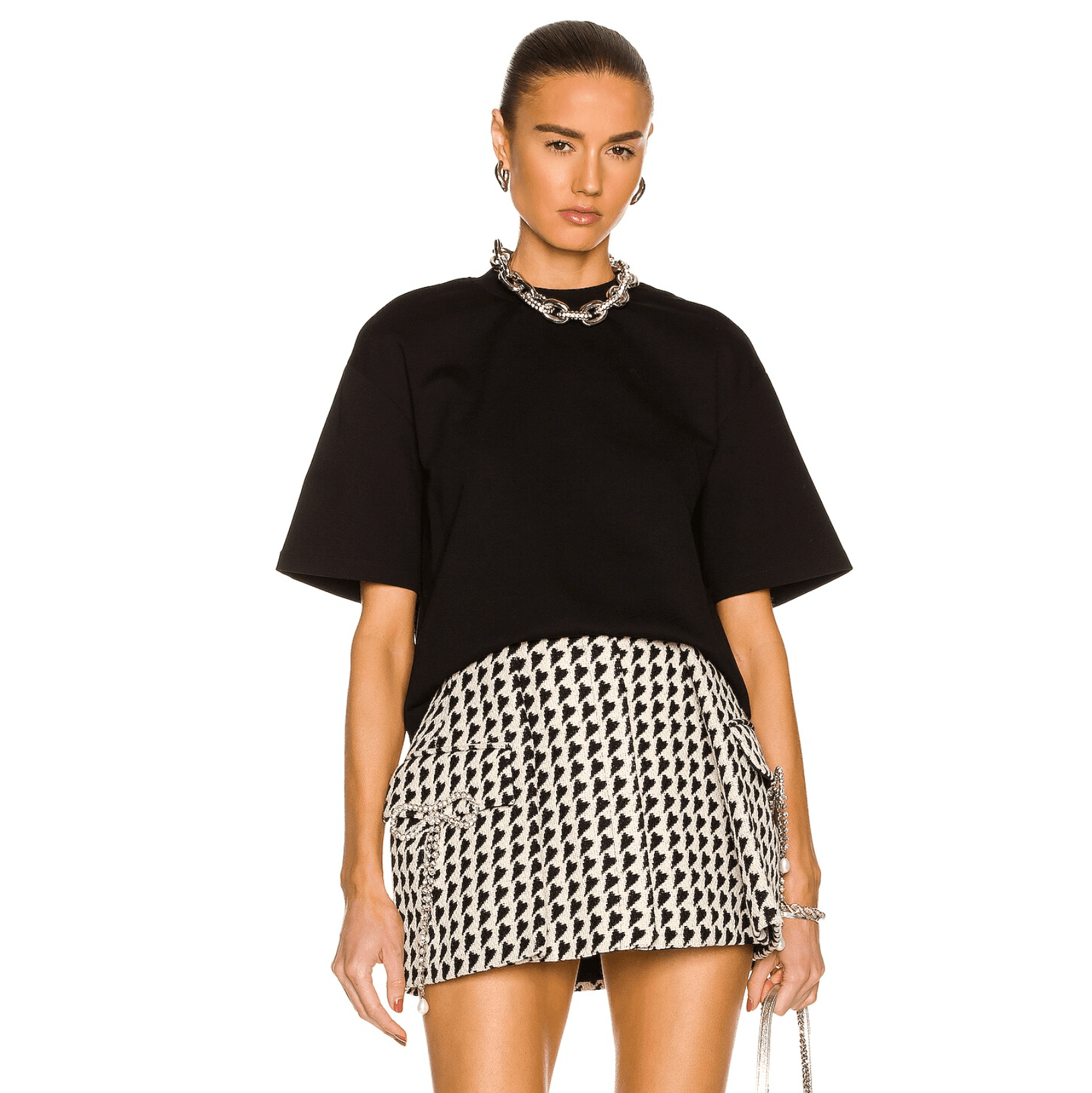 Black oversized tee with houndstooth mini skirt, chic daywear look