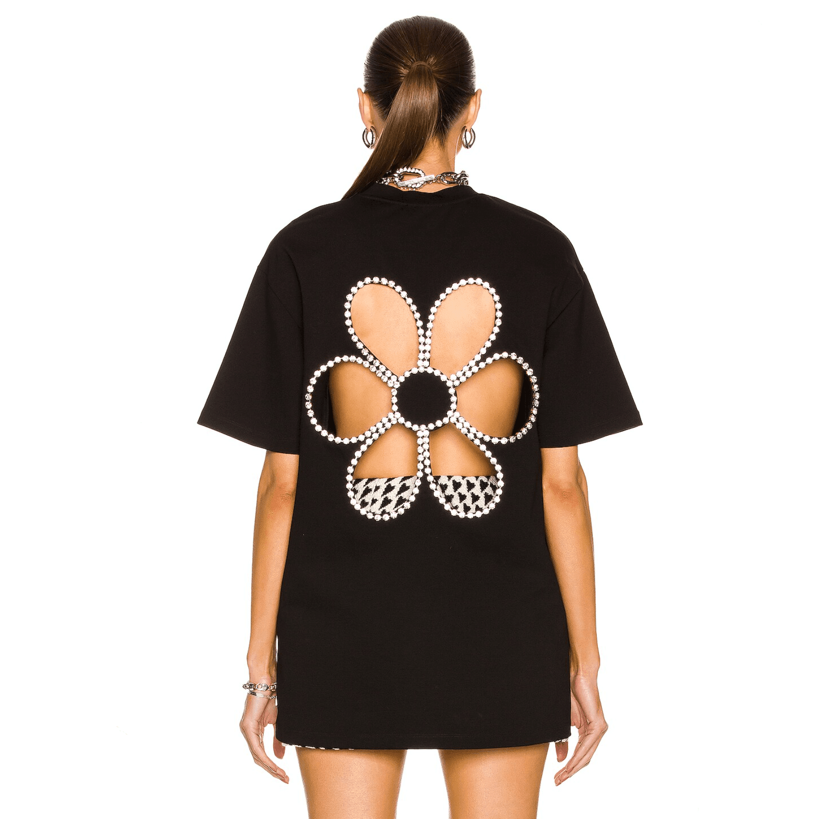 Black dress with pearl-embellished floral cutout back.