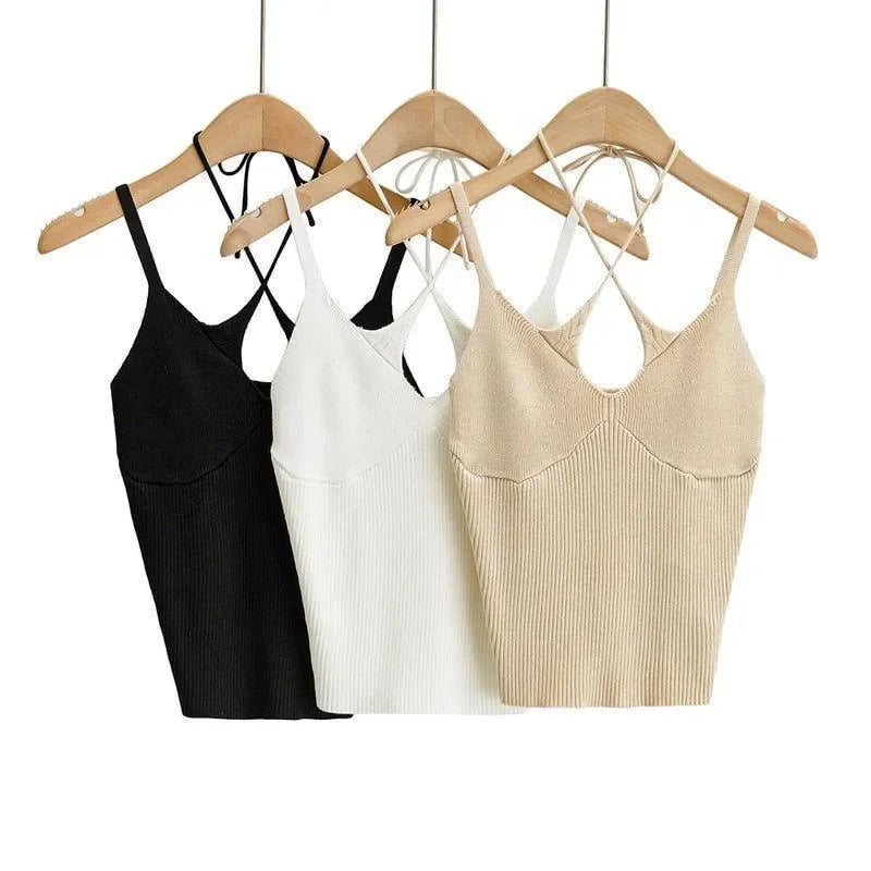 Black cotton cross halter top featuring ribbed texture and back straps, perfect for casual summer outings or layered looks.