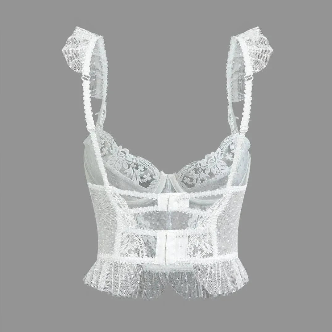 White lace cami top with ruffle trim, delicate straps, and a fitted silhouette for elegant layering or solo wear.