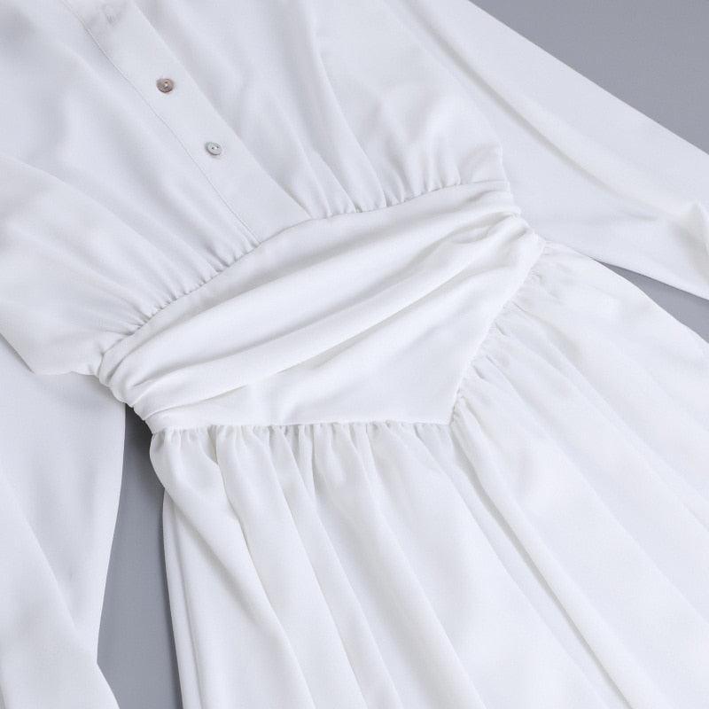 White gathered long-sleeve dress, elegant evening style
