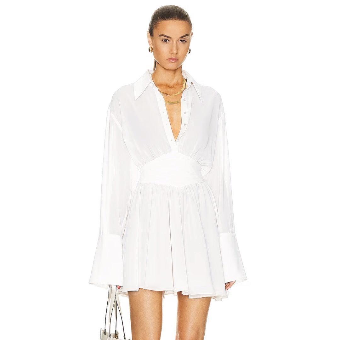 White button-up shirt dress with wide cuffs and cinched waist, versatile chic style