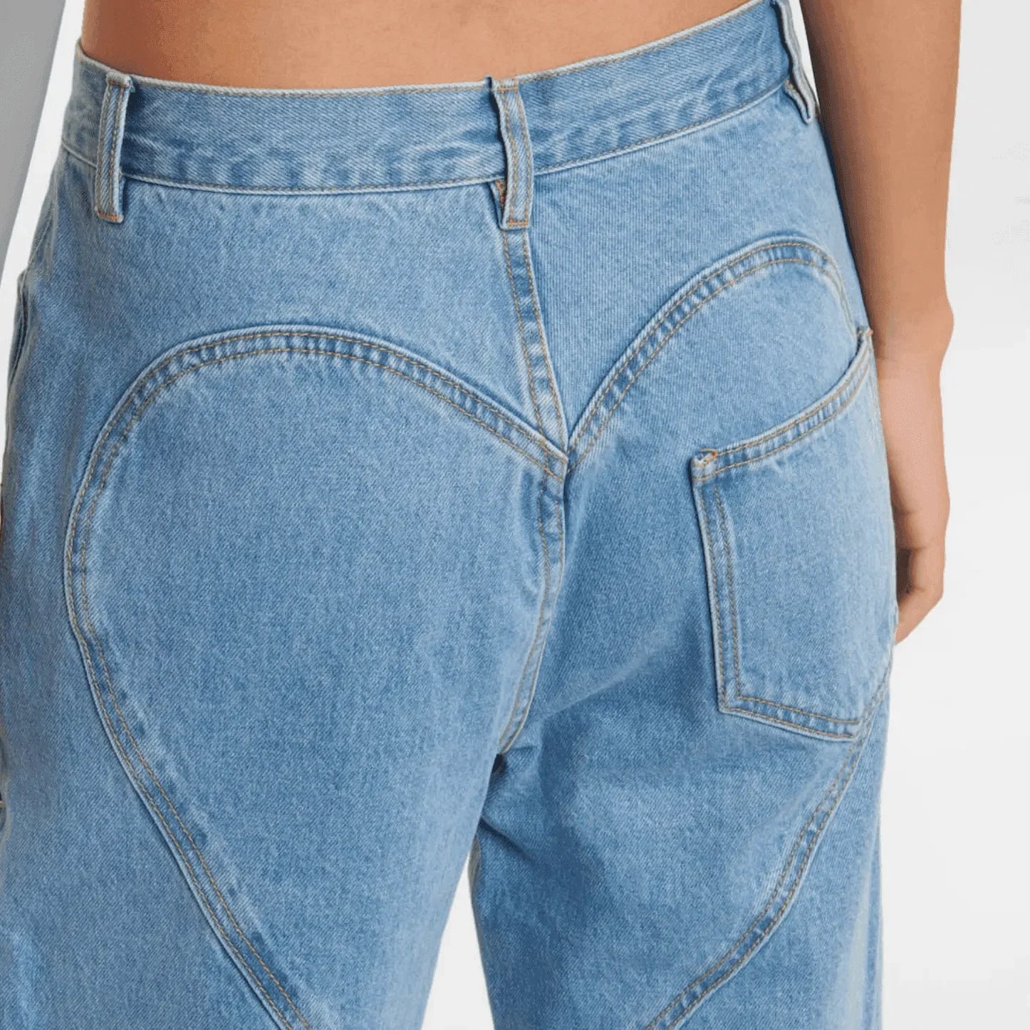 Heart-stitched high-waisted denim jeans, casual daytime wear