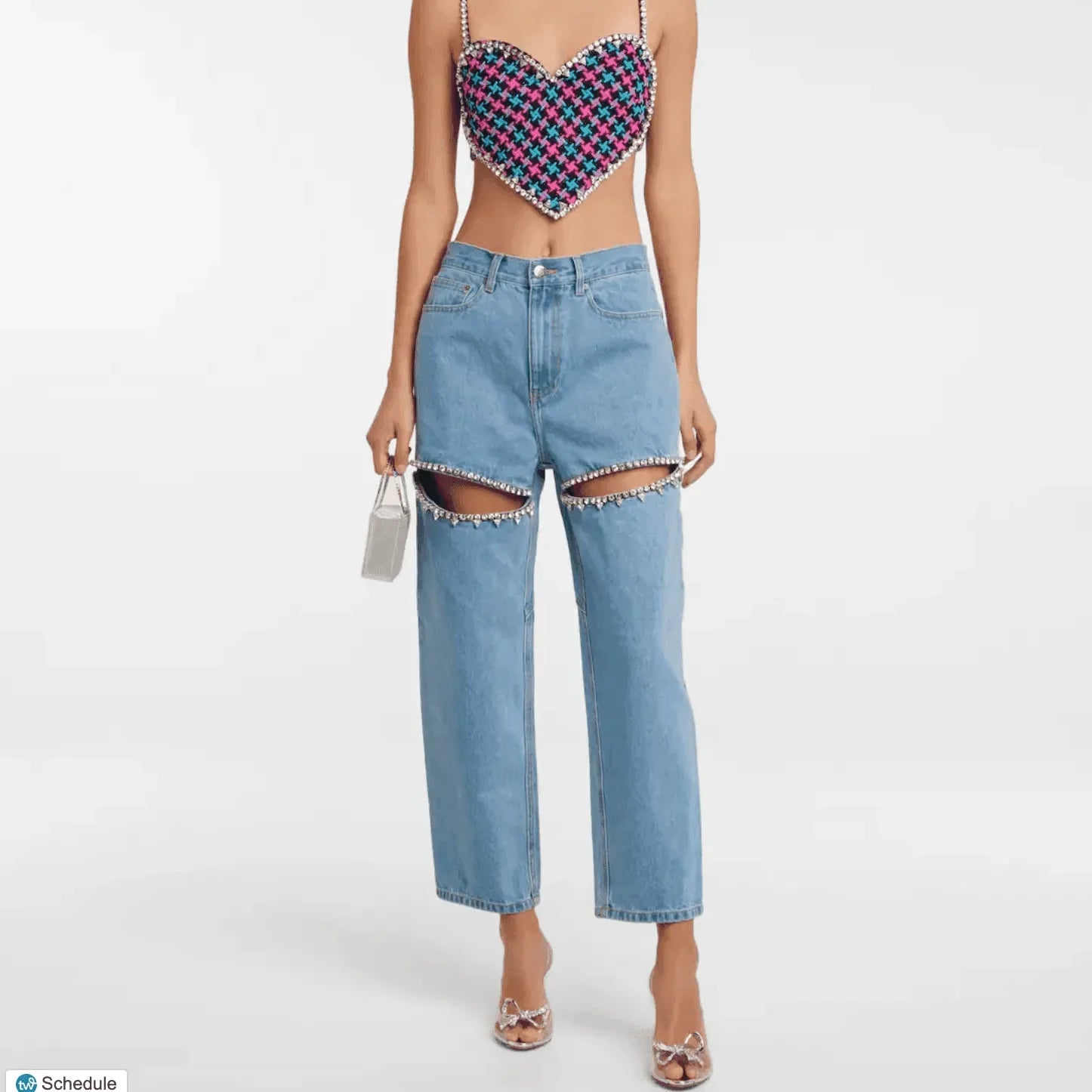 rhinestone heart-shaped top and distressed jeans with rhinestone trim, party outfit