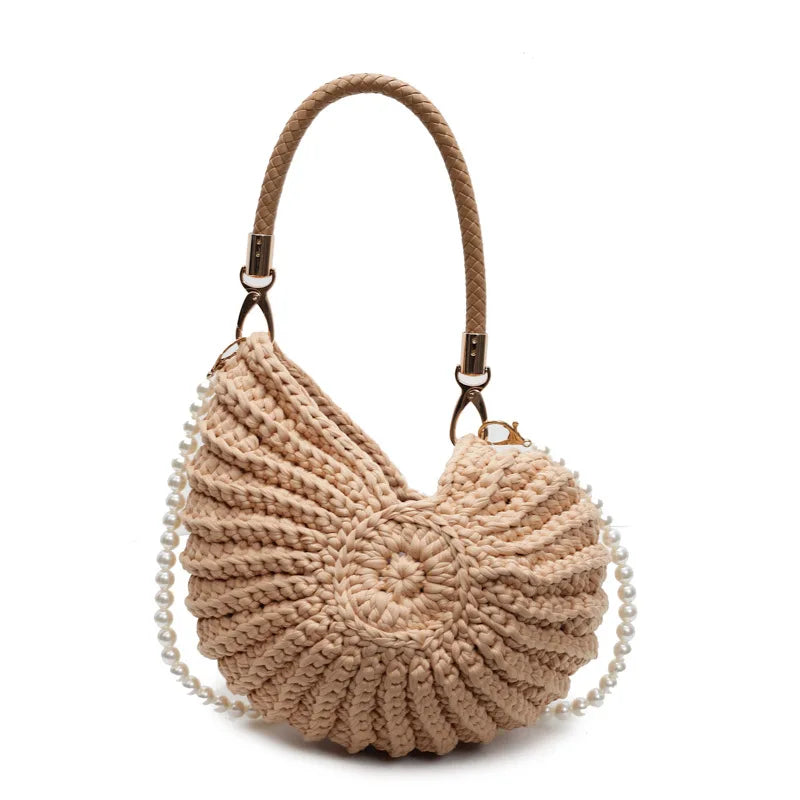 Knitted shell-shaped handbag with pearl embellishment, unique accessory piece