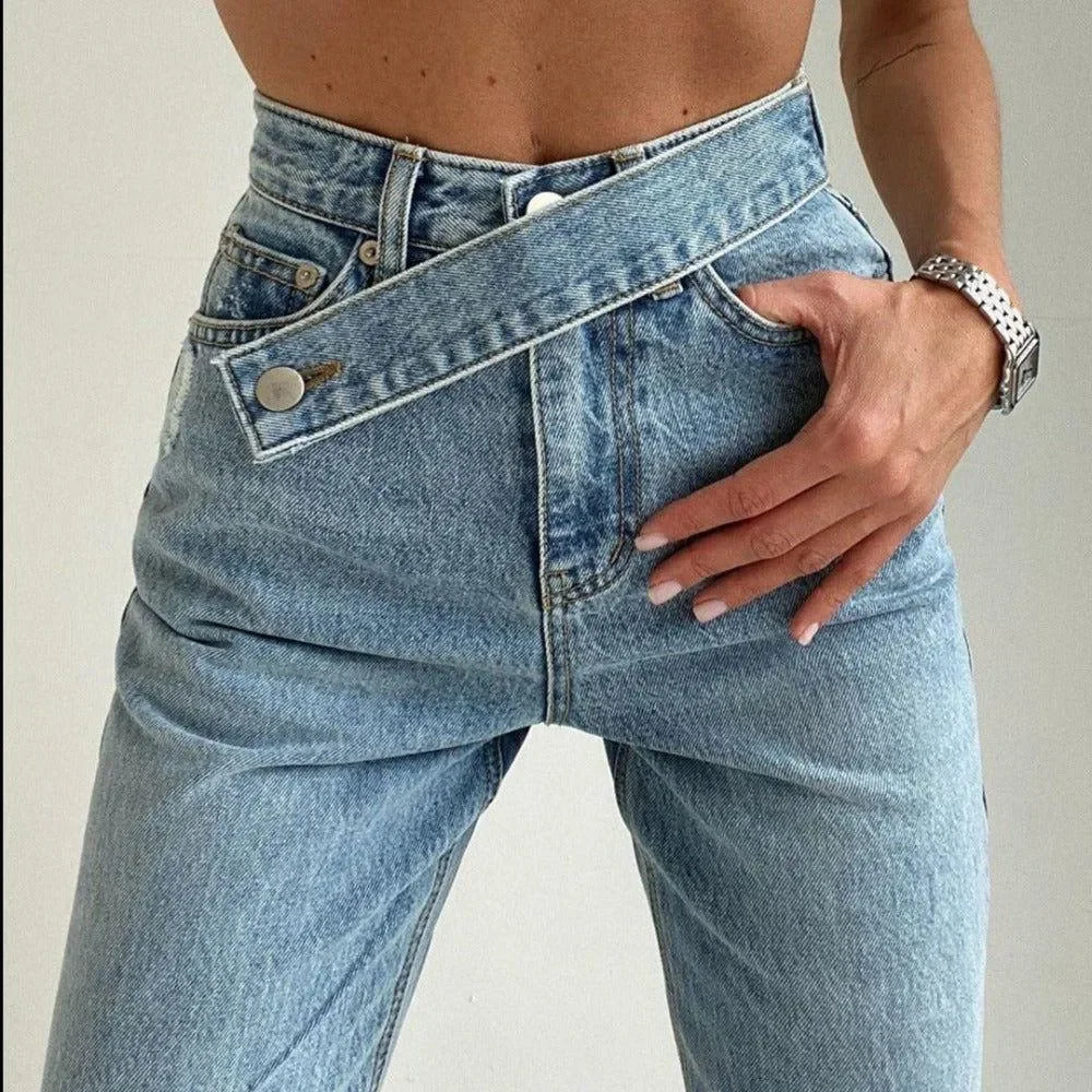 asymmetrical high-waisted denim jeans with button detail