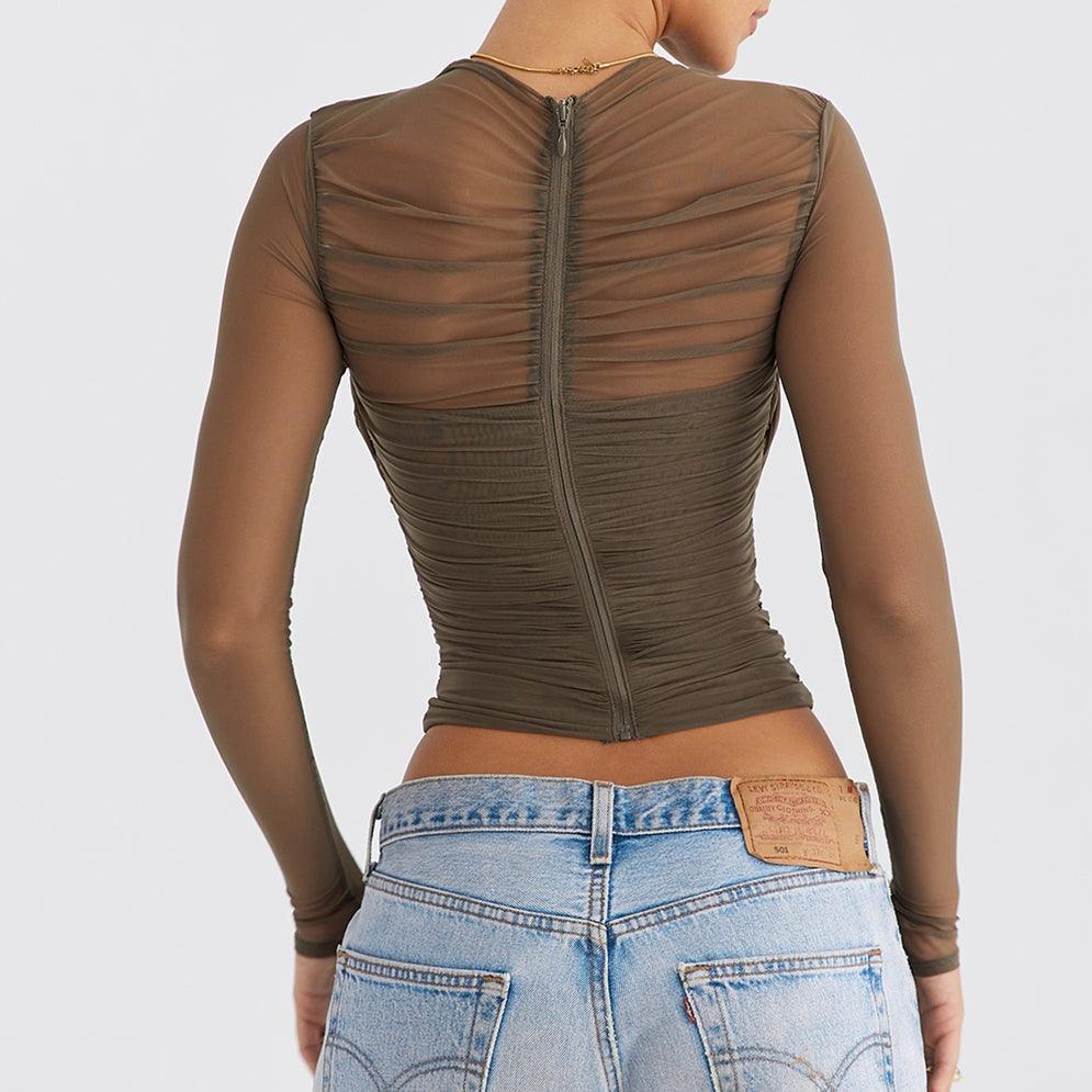 Ruched mesh long-sleeve top with back zipper, casual chic style.