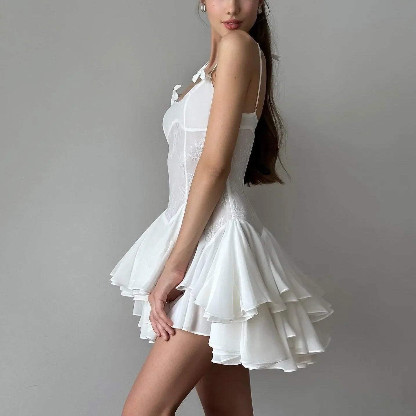 Lace bodice mini dress with layered ruffle skirt, elegant party outfit.