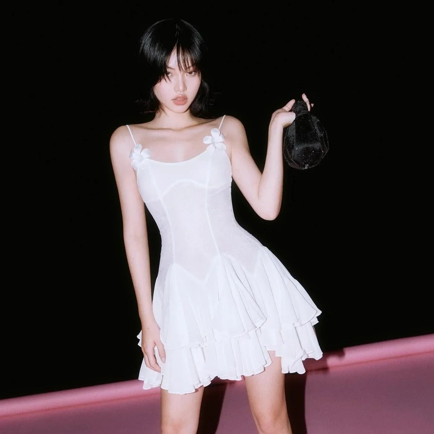 White spaghetti-strap mini dress with ruffled hem, night-out party style