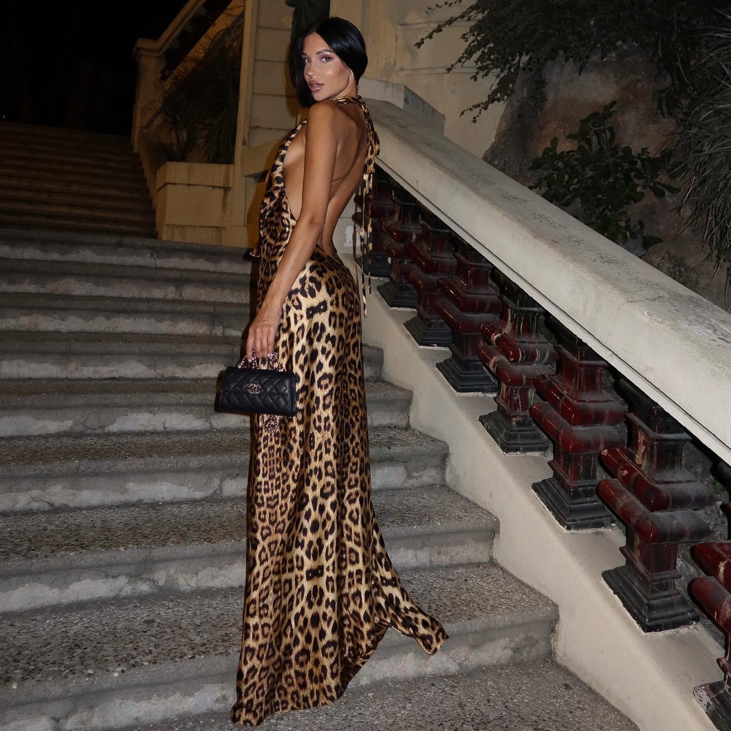 Leopard print backless satin maxi dress, evening and party wear styling.