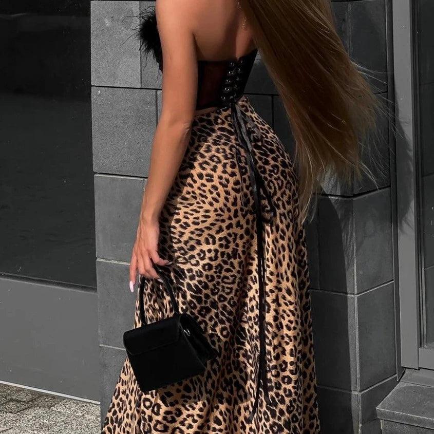 Leopard print strapless dress with black feather top, evening party look