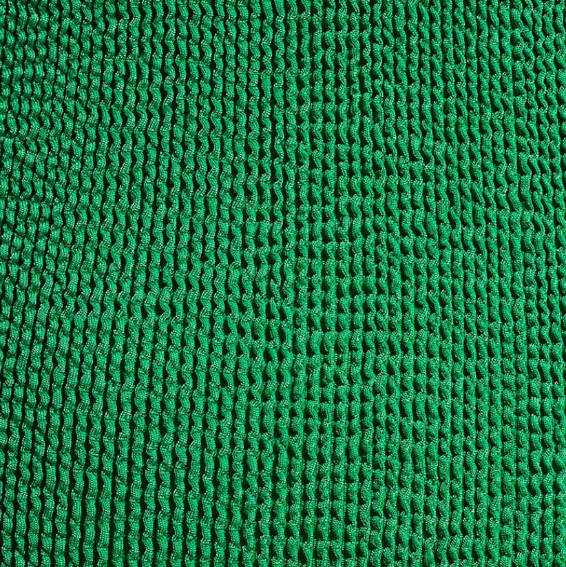 green textured fabric, ruched material detail