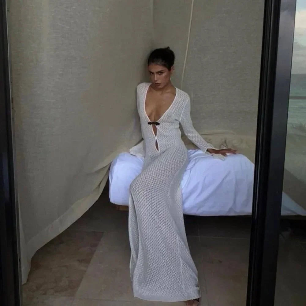 White knit maxi dress with a front cut-out and tie detail.