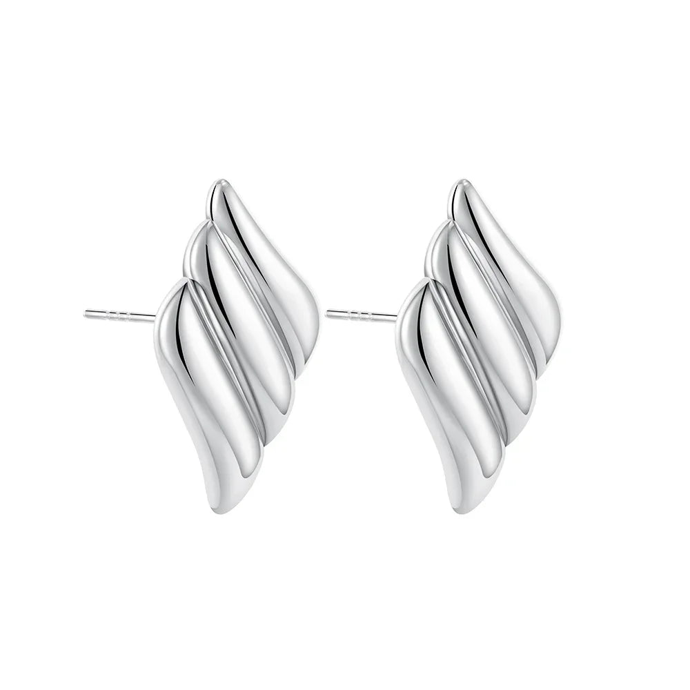 Silver spiral textured earrings.