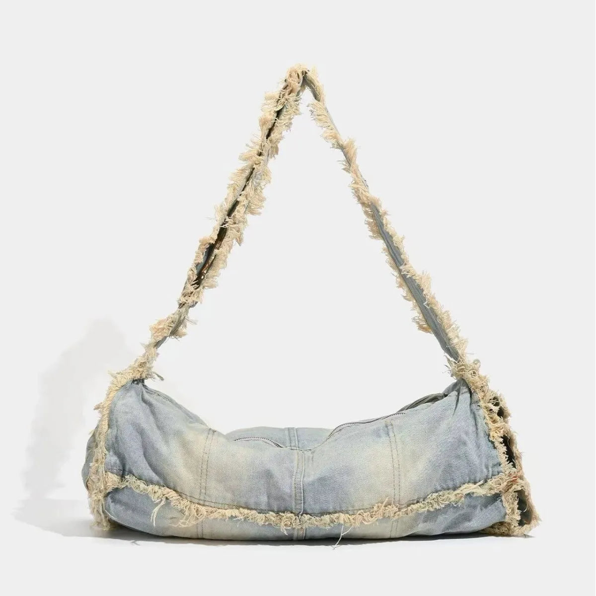 Frayed denim shoulder bag, casual accessory piece.
