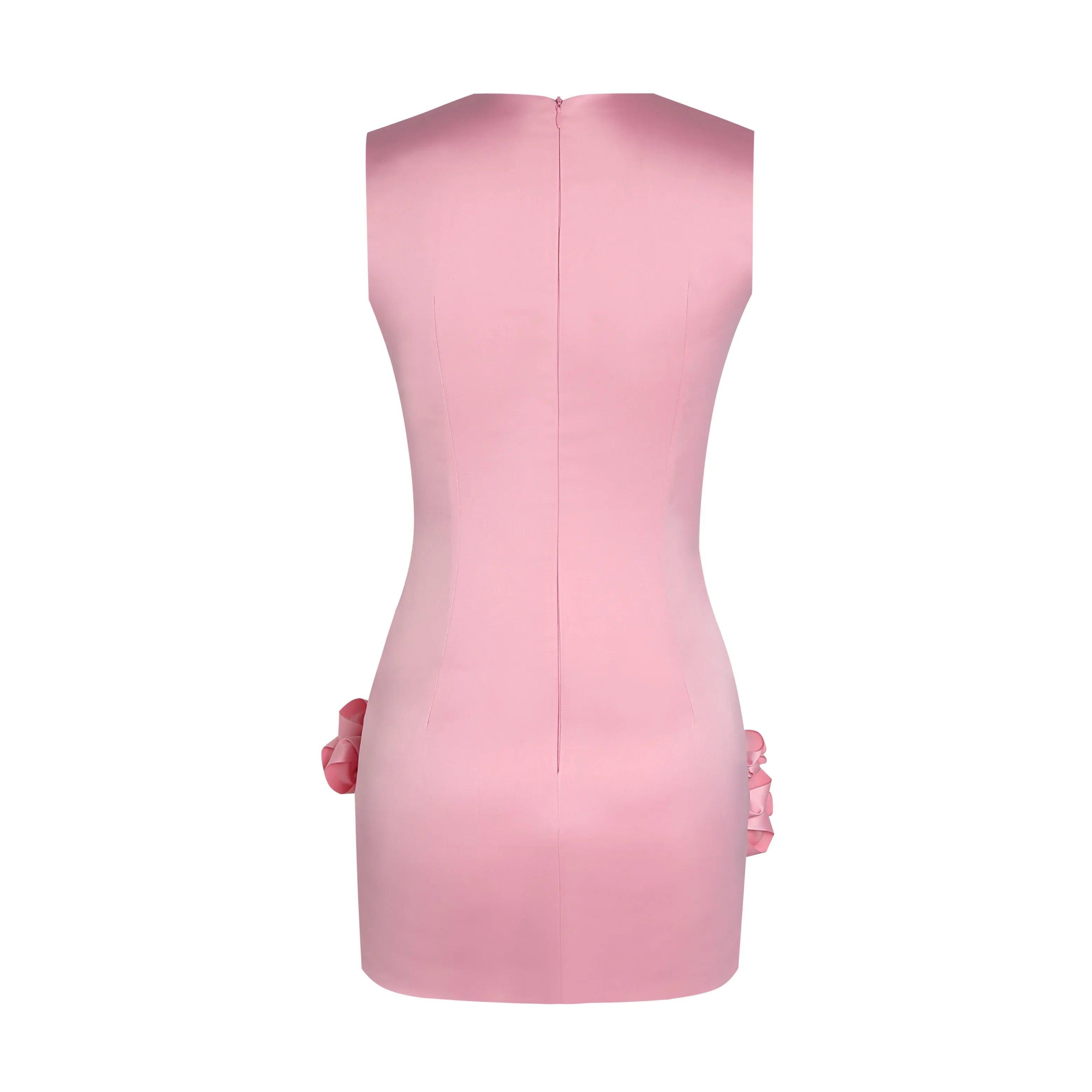 Pink sleeveless mini dress with side ruffle details, party outfit.