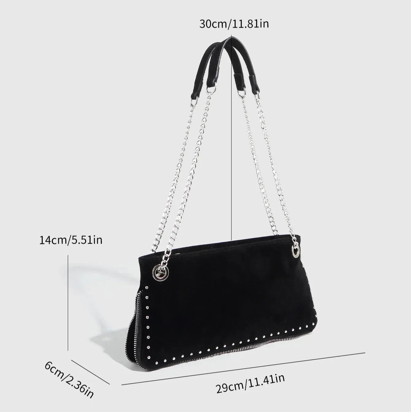 Black suede clutch with silver chain strap and studded details, versatile accessory for evening