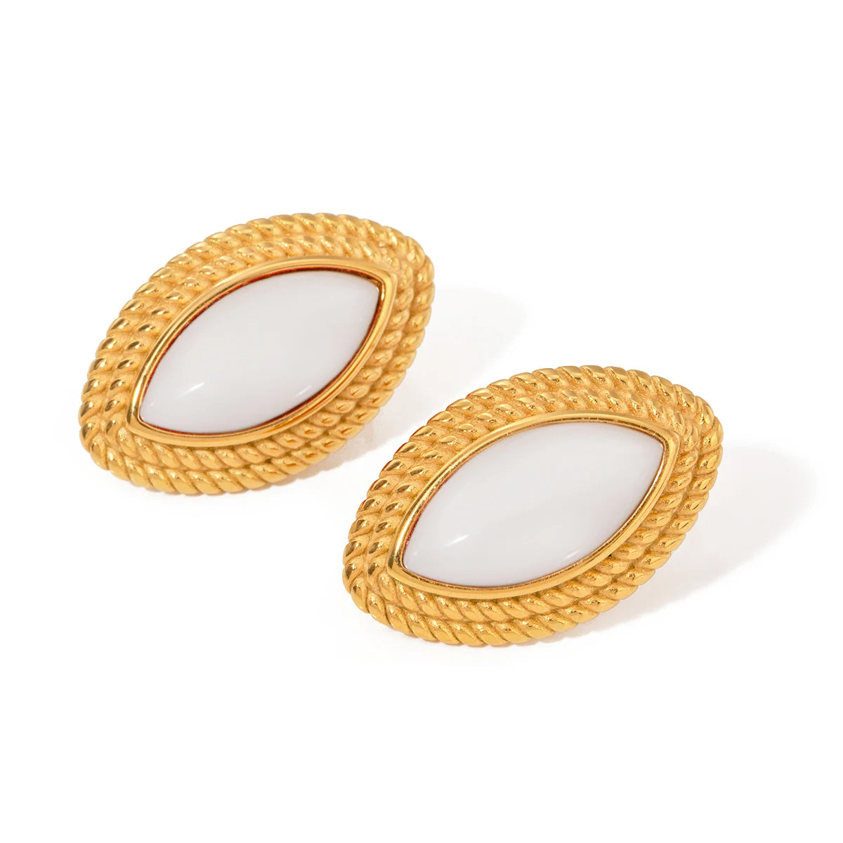 Gold and white enamel clip-on earrings.