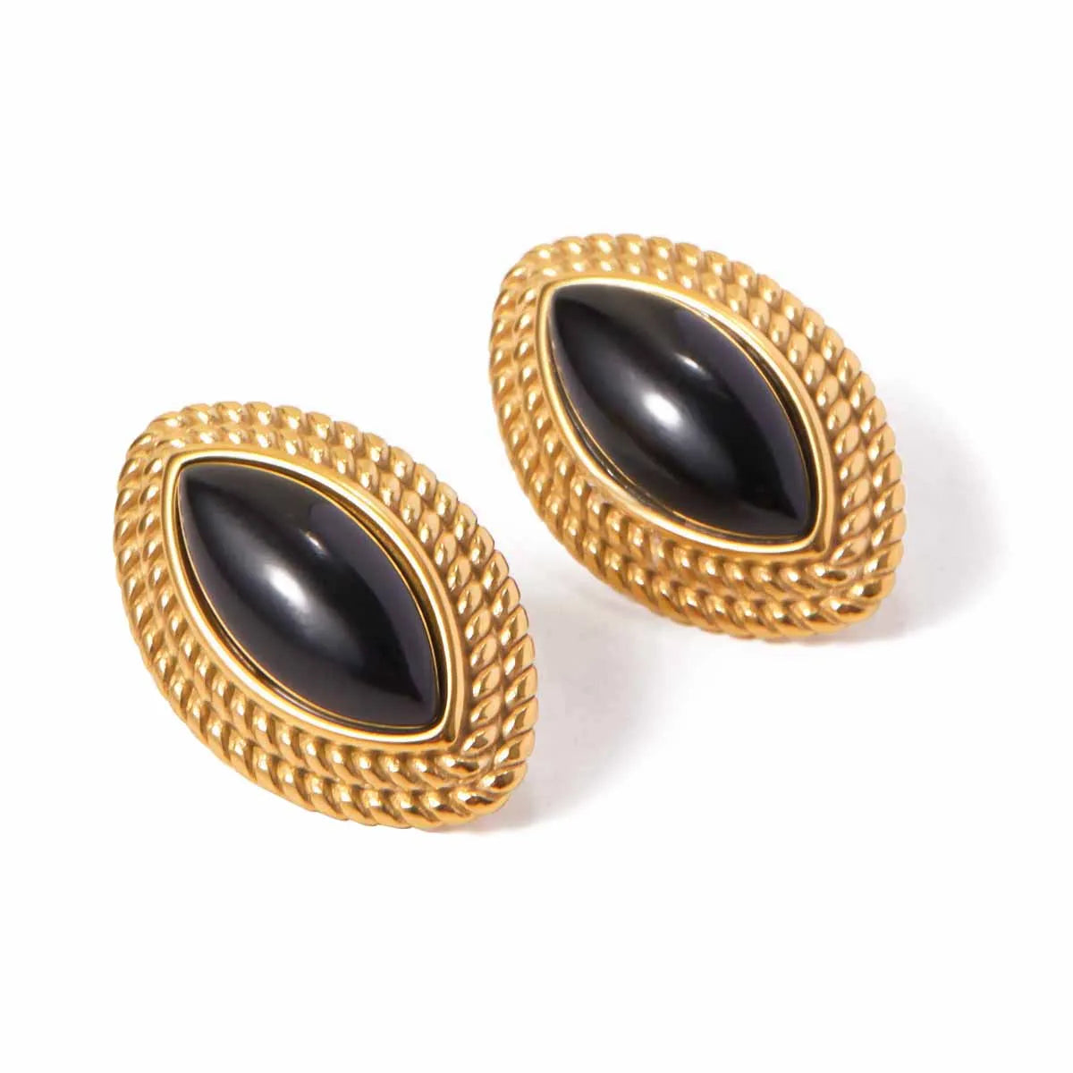 Gold-tone earrings with black stone accents, elegant accessory piece
