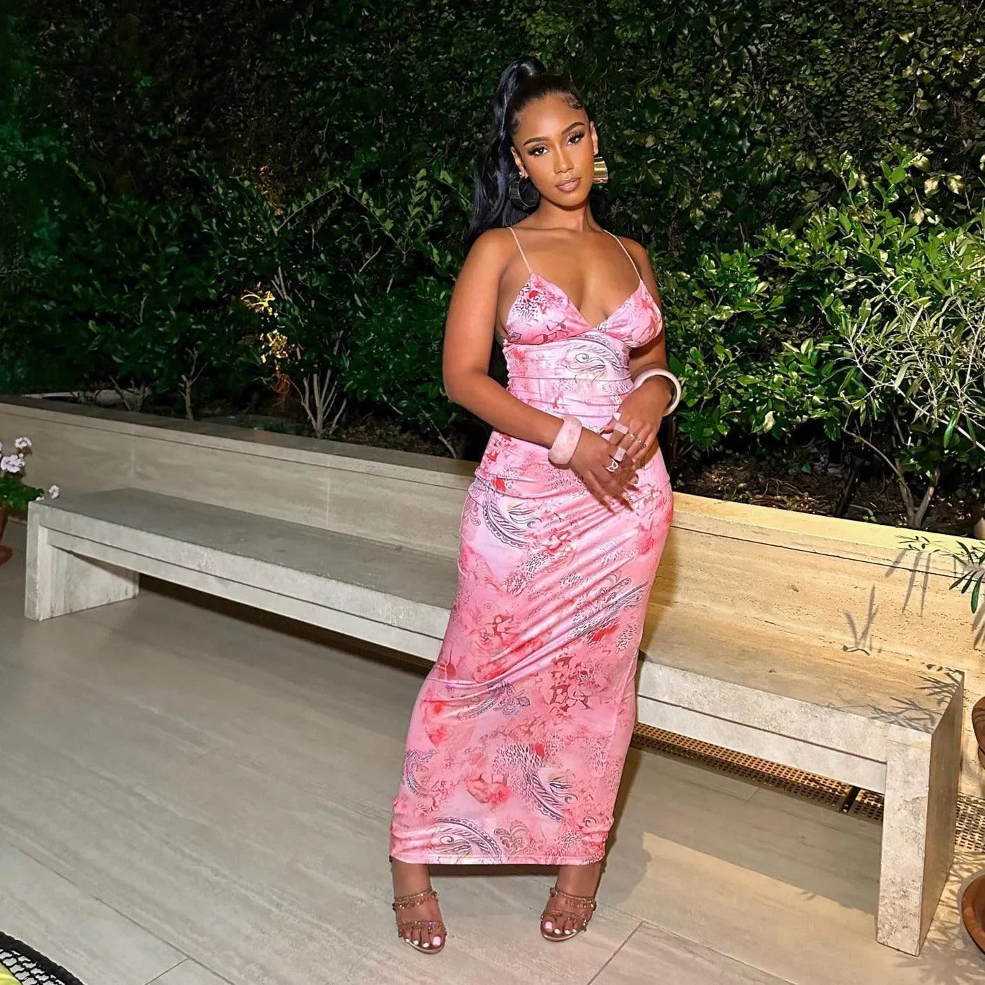 Pink satin maxi dress with printed design, chic evening attire