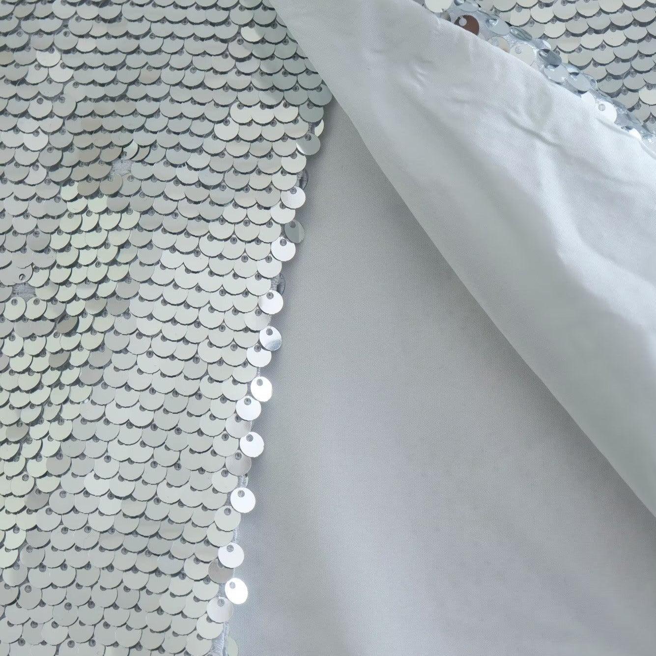 Silver sequin fabric, glamorous party wear material.