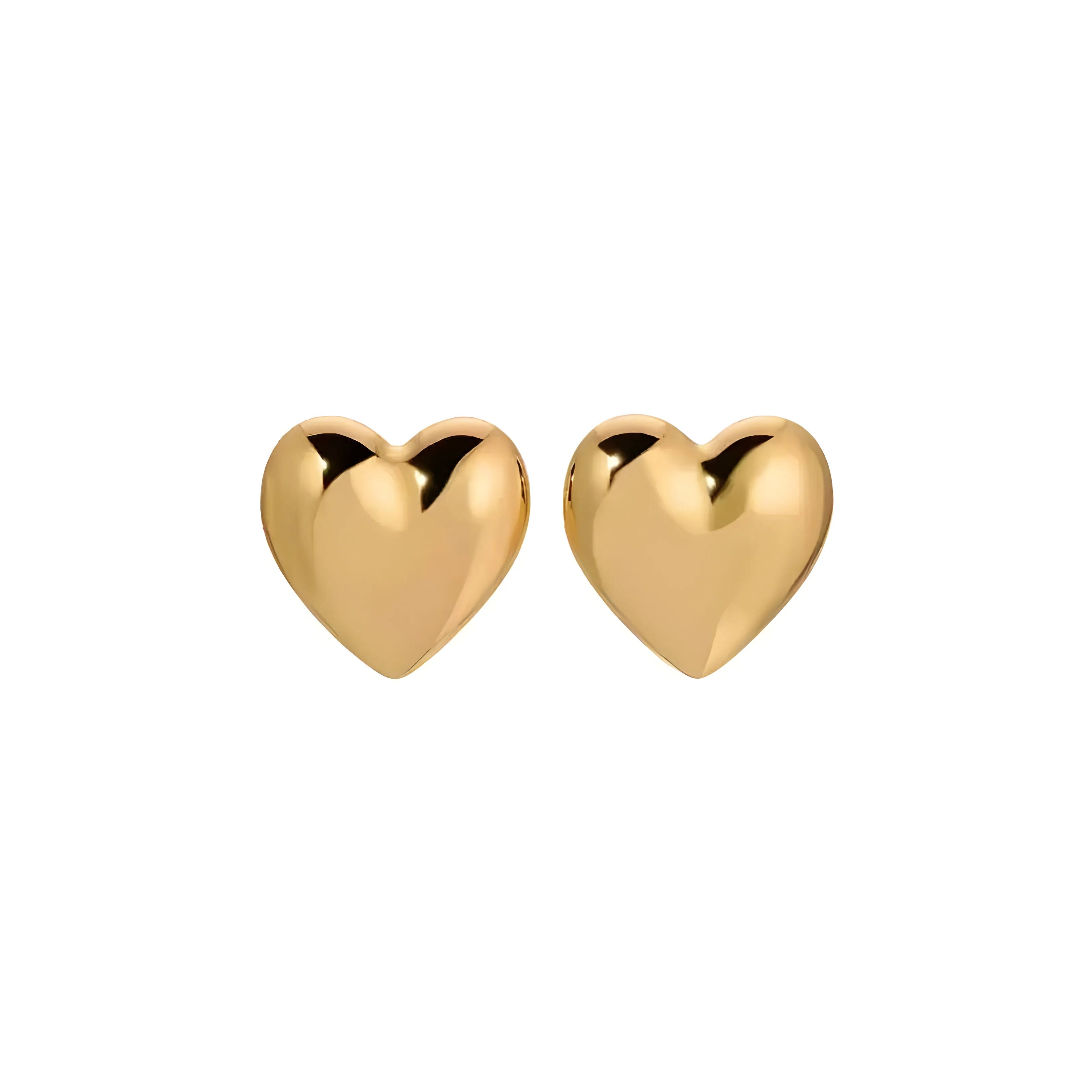Gold heart-shaped stud earrings, chic accessory for day or night styling